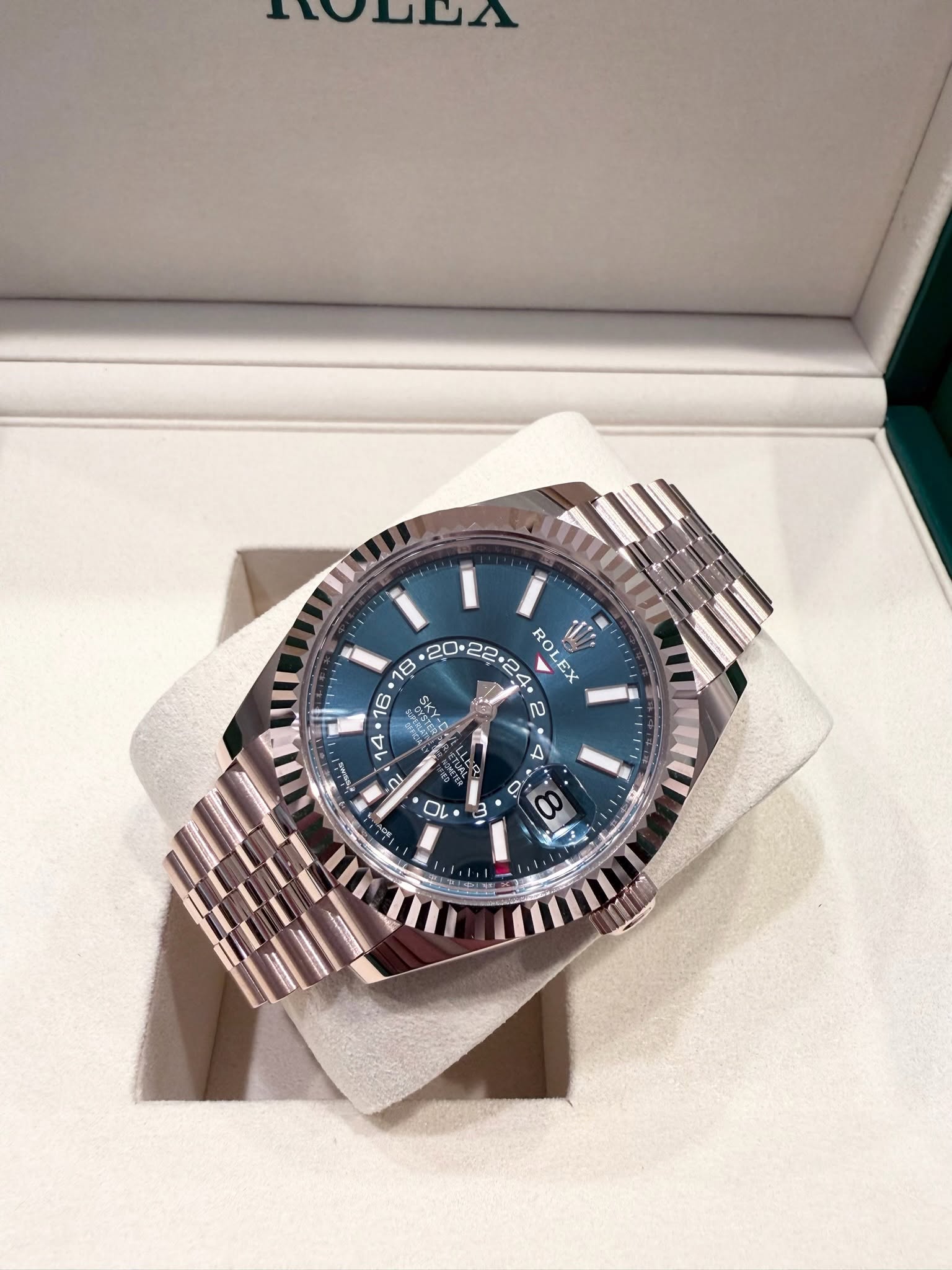 May be an image of wrist watch and text