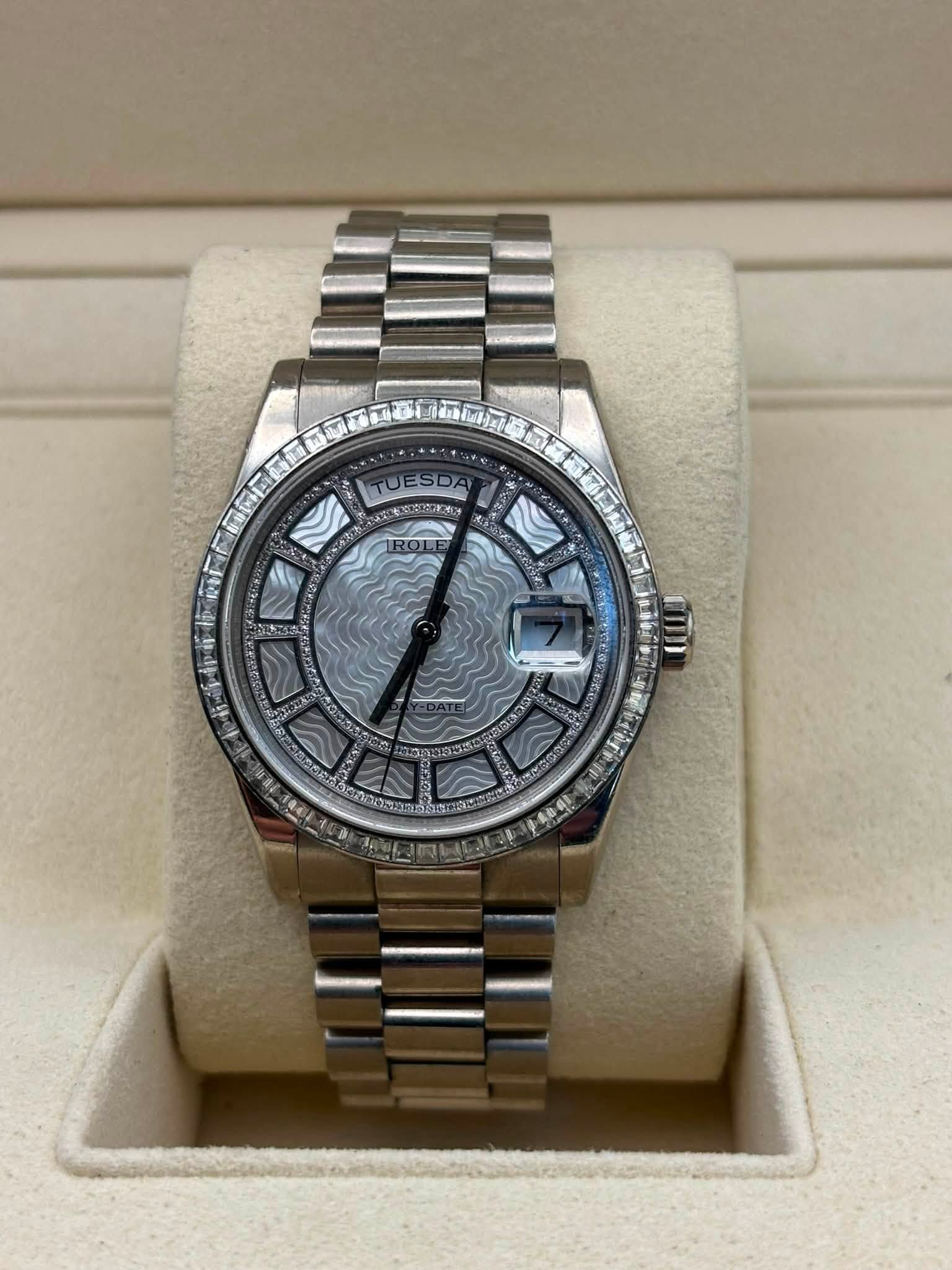 May be an image of wrist watch and text