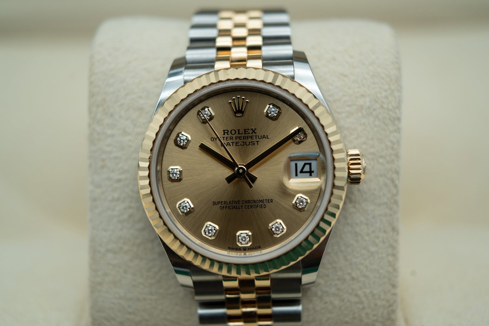 May be an image of wrist watch and text