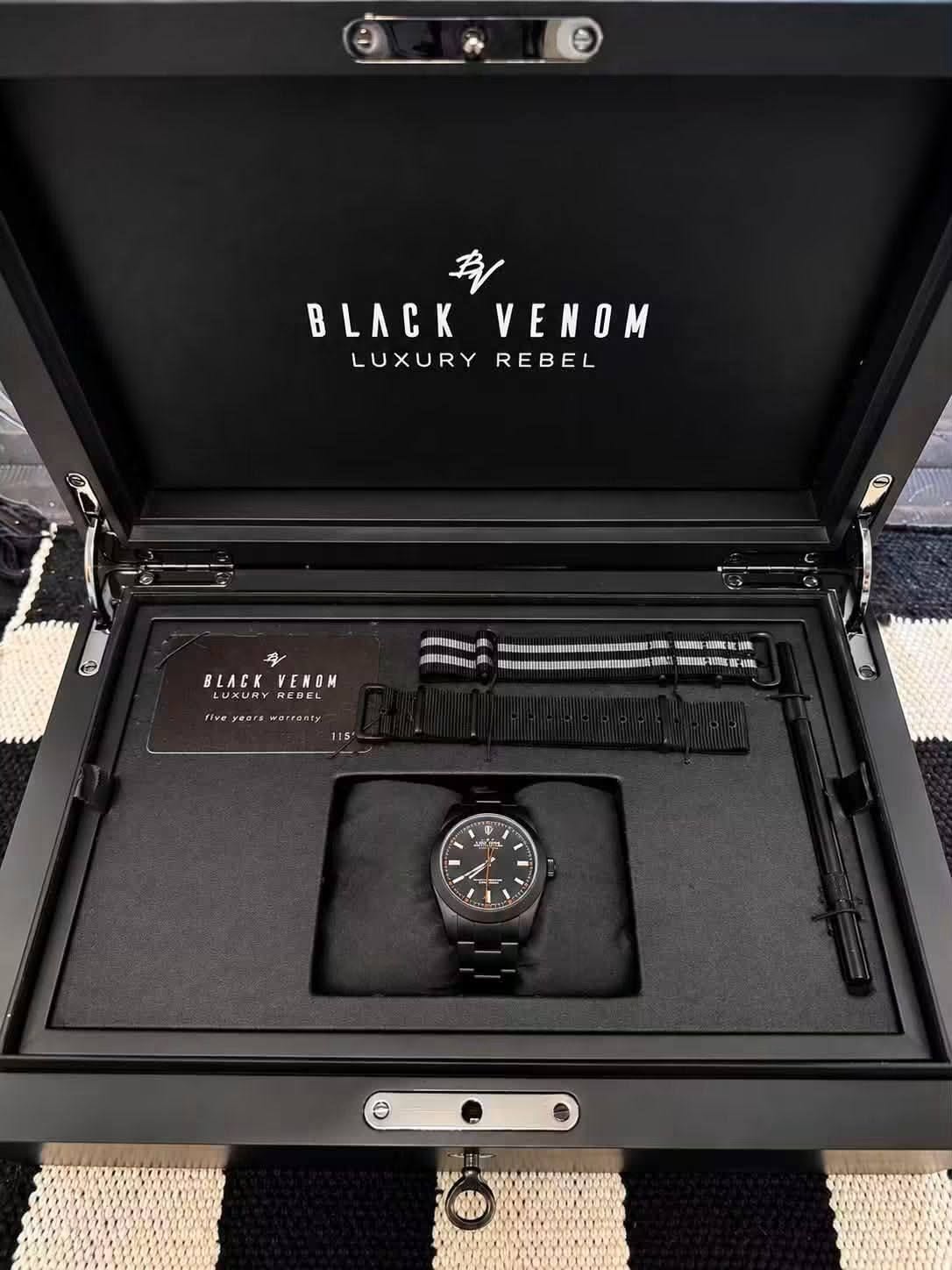 May be an image of wrist watch and text