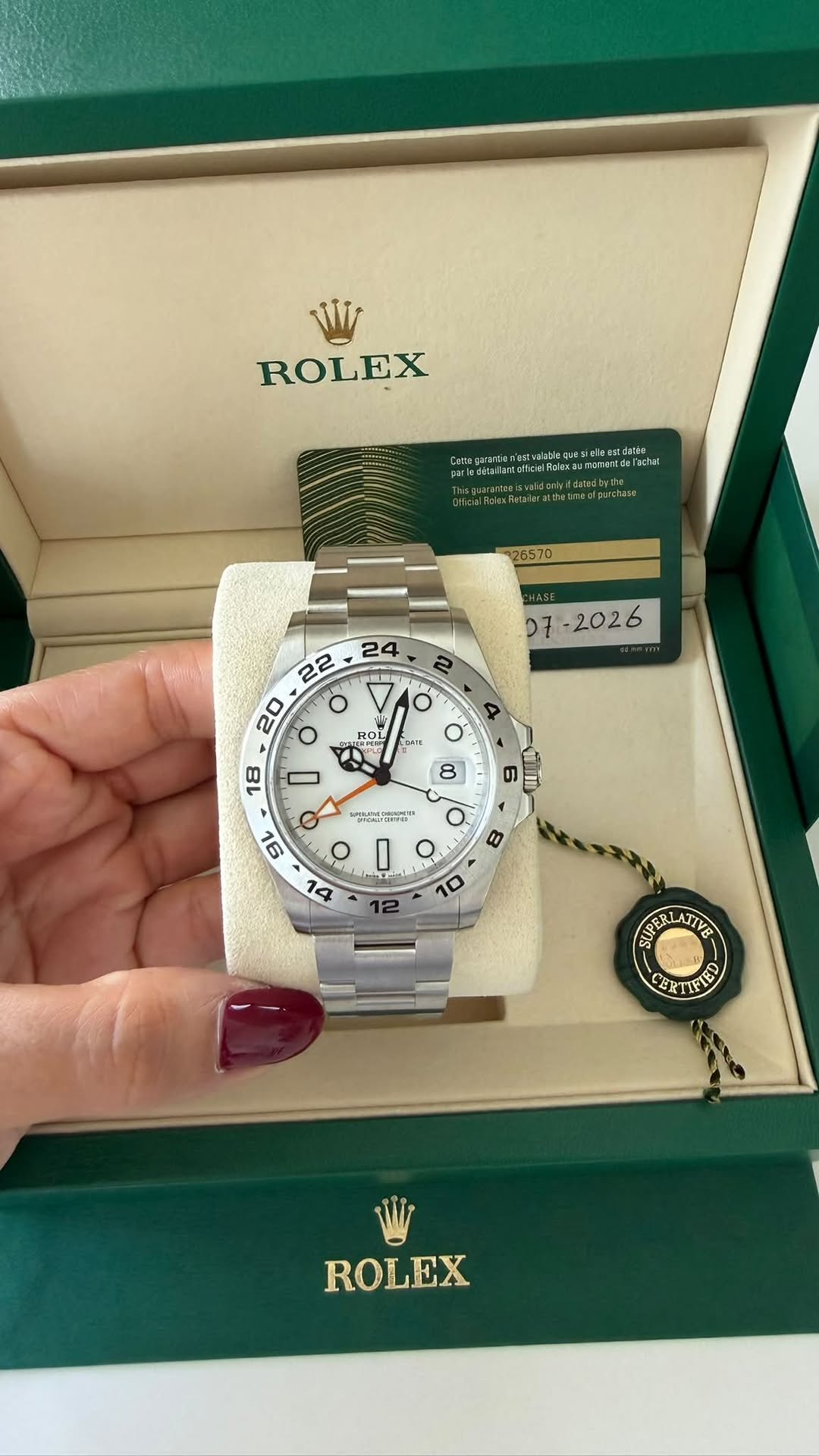 May be an image of wrist watch and text