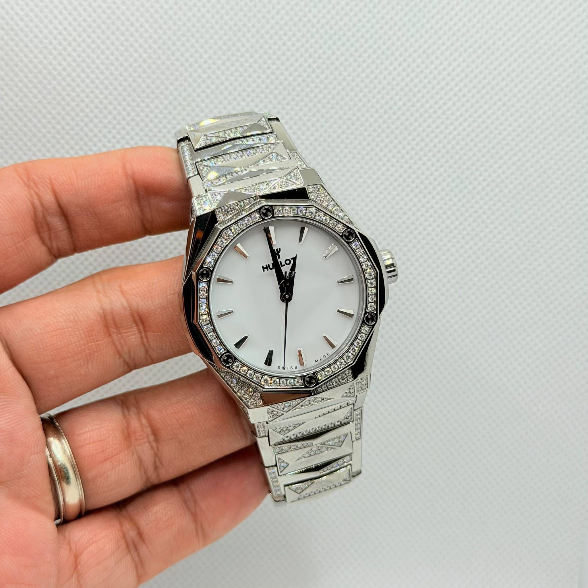 May be an image of digital watch and text