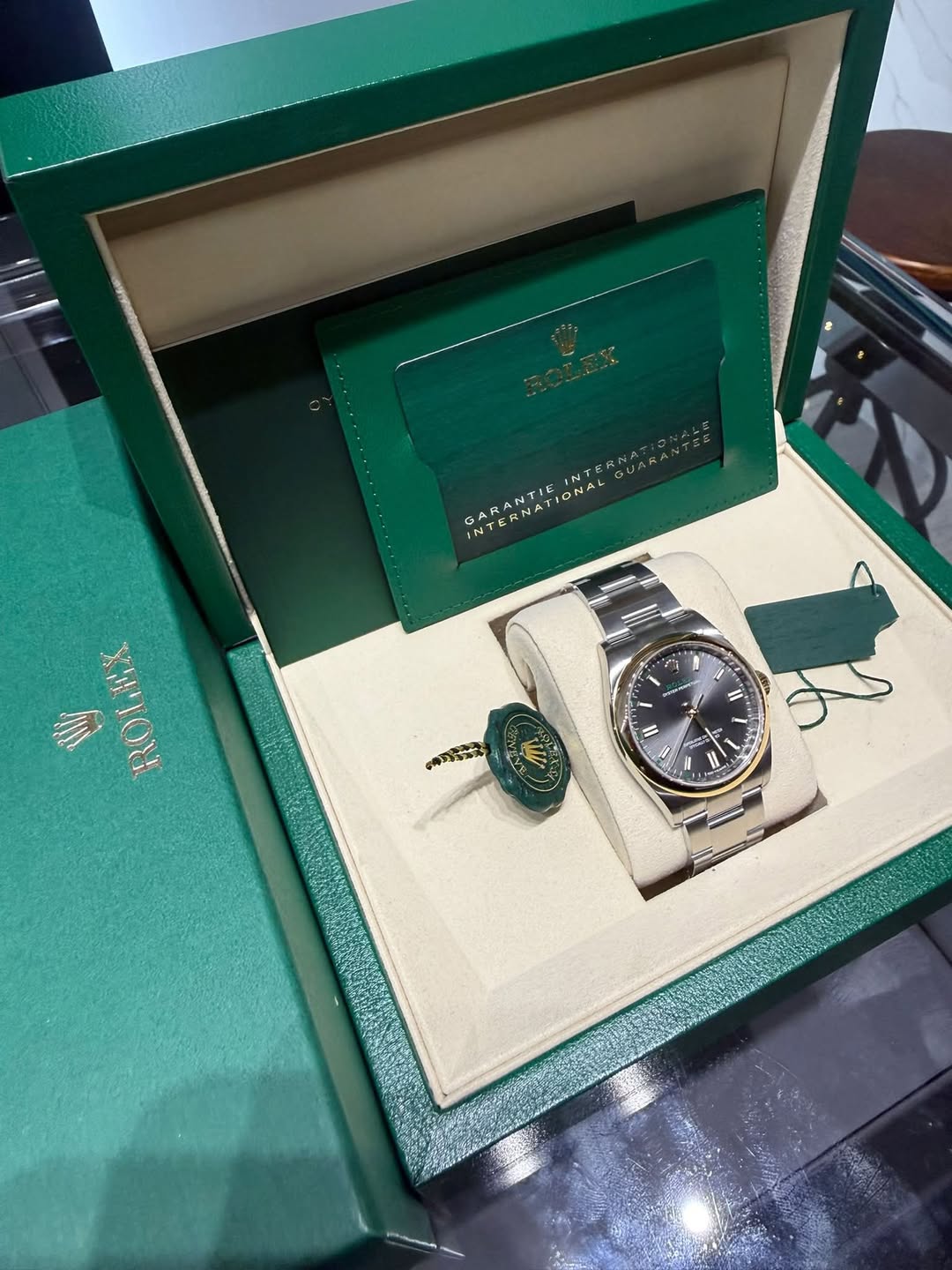 May be an image of wrist watch and text