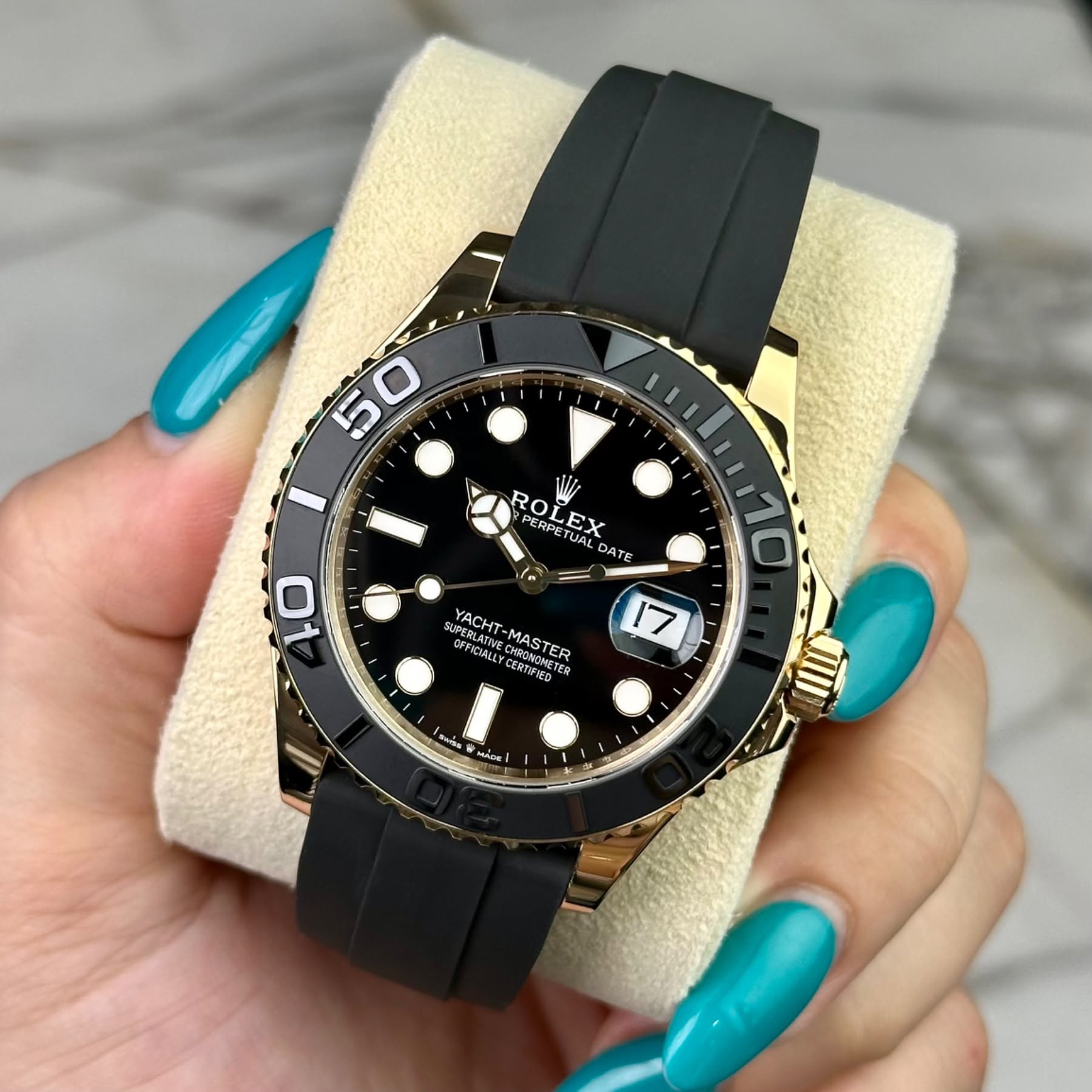 May be an image of wrist watch and text