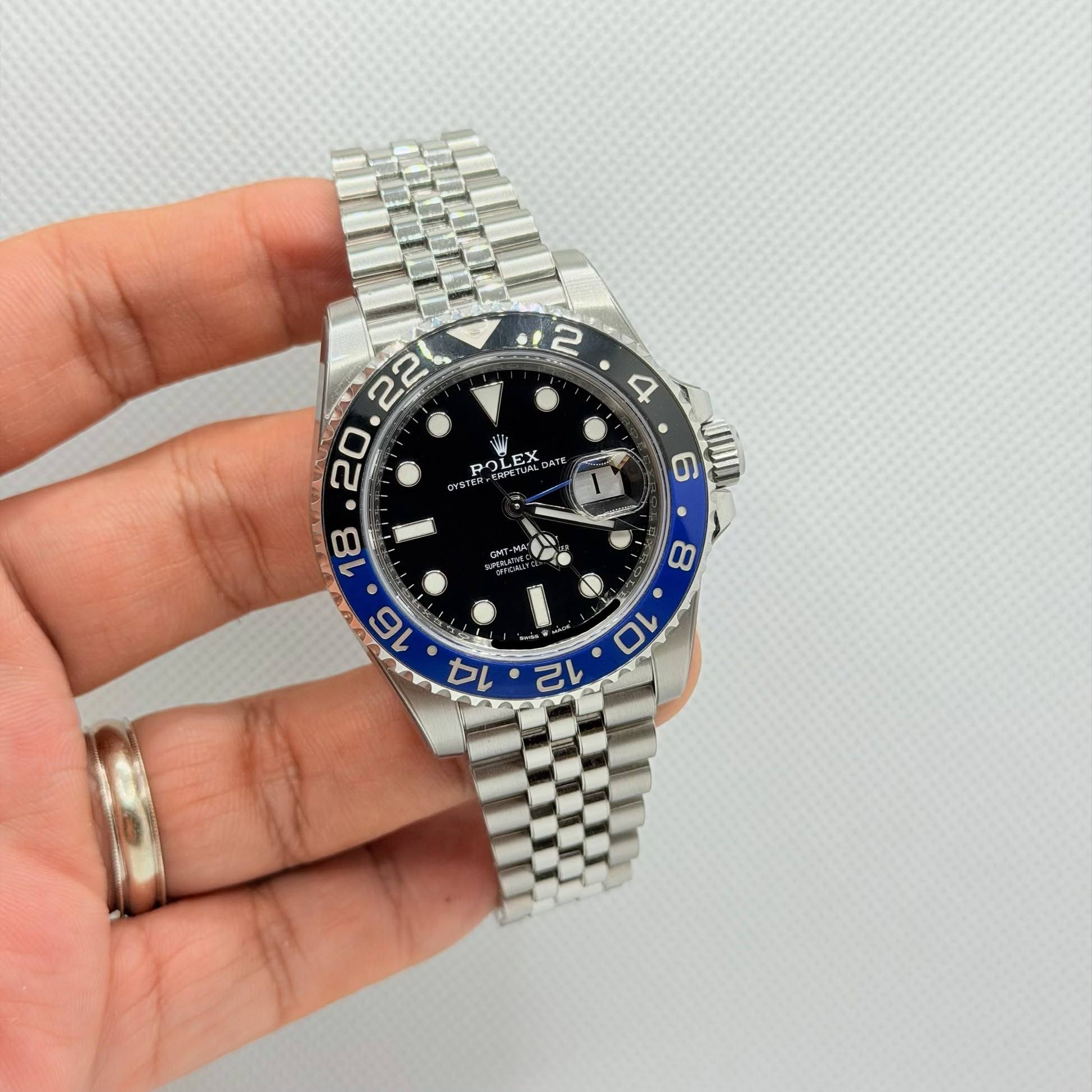 May be an image of wrist watch and text that says '12 2 4 וש OLE رم OLEX מרא"ש いょそだ LEX ah7 JUO 8 ارا '