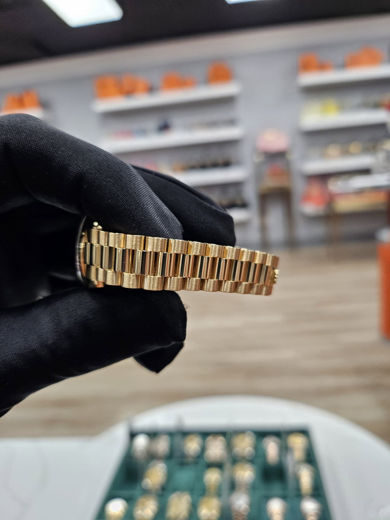 May be an image of wrist watch and jewelry