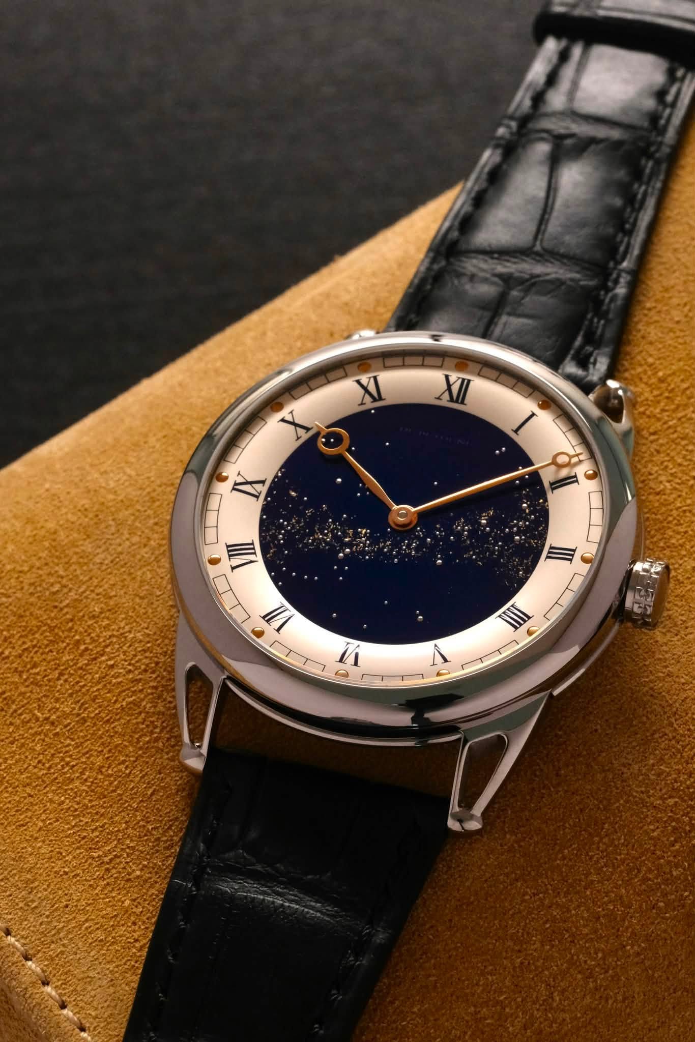 May be an image of wrist watch and text that says 'XI XII 1 IX 1 X I VII II VII IIII i1'