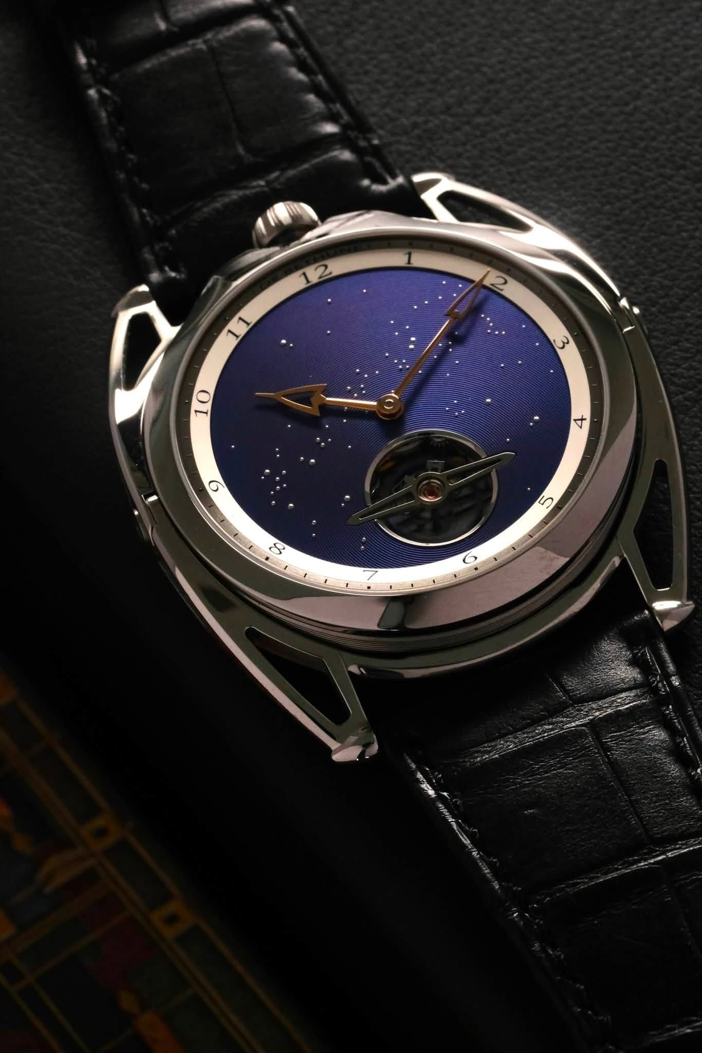 May be an image of wrist watch and text that says '๑ 6 4 ഗ O'
