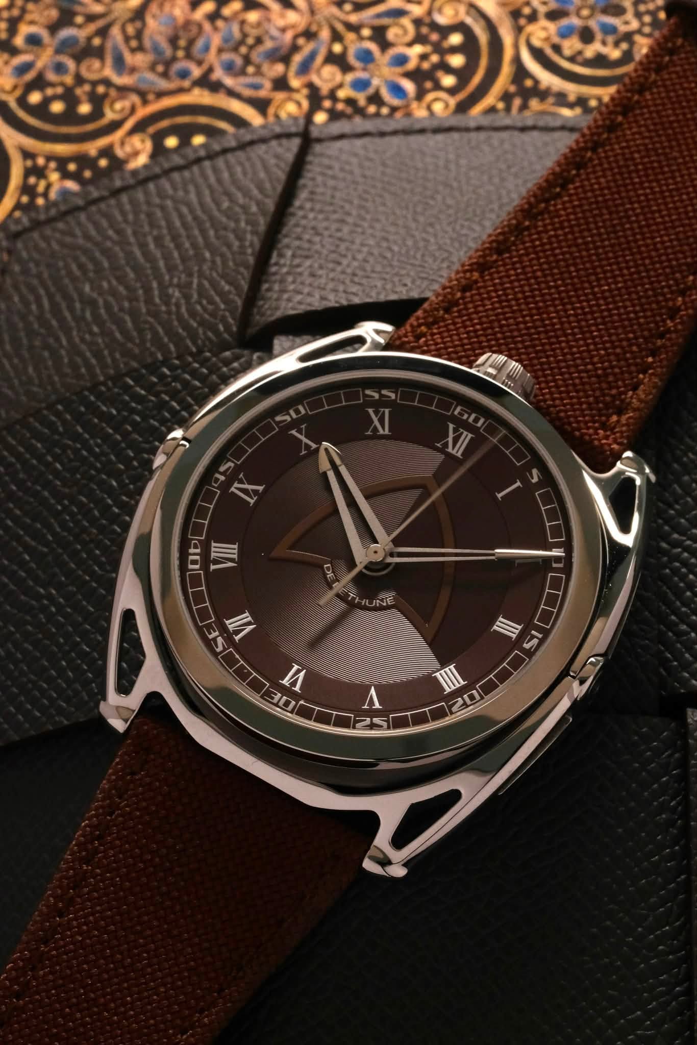 May be an image of wrist watch and text