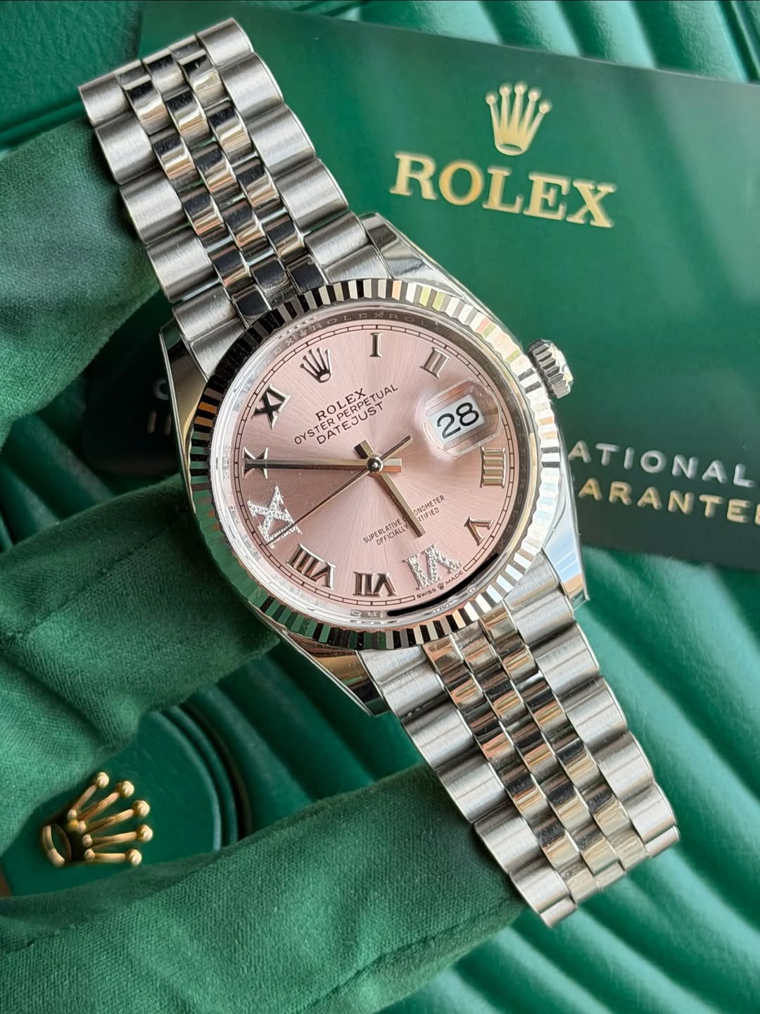 May be an image of wrist watch and text