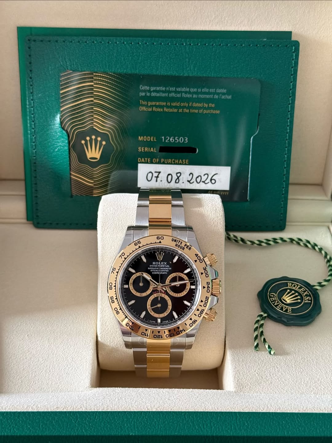 May be an image of wrist watch and text