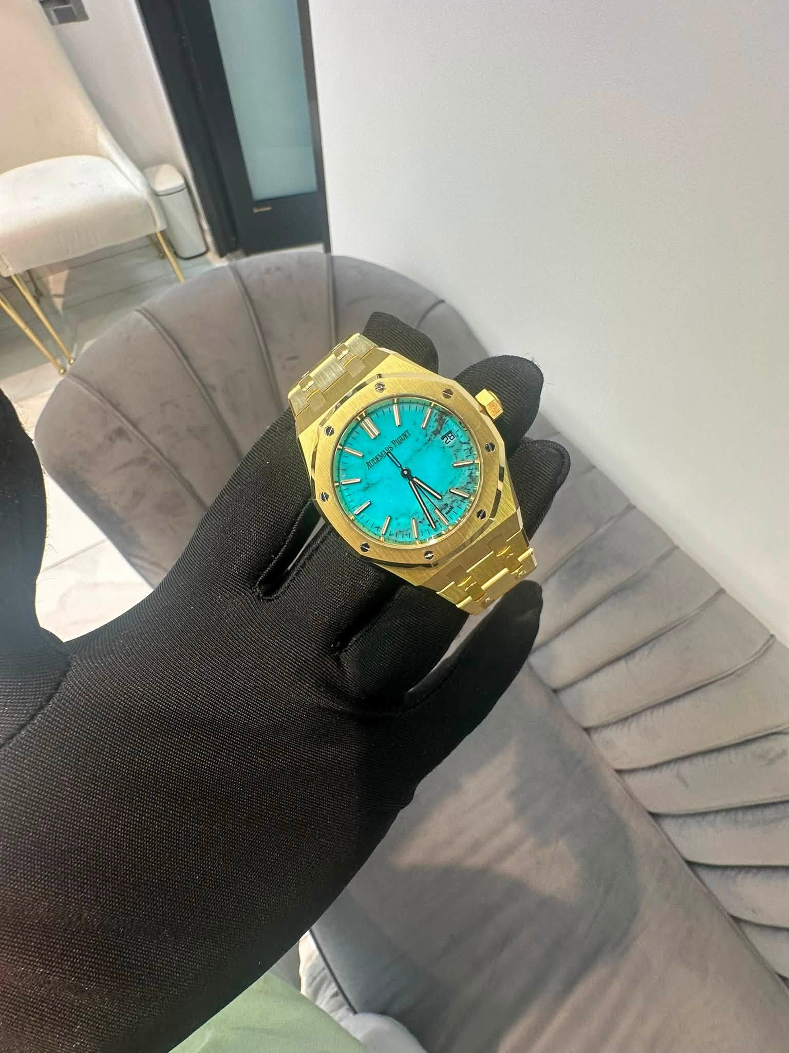 May be an image of wrist watch and text