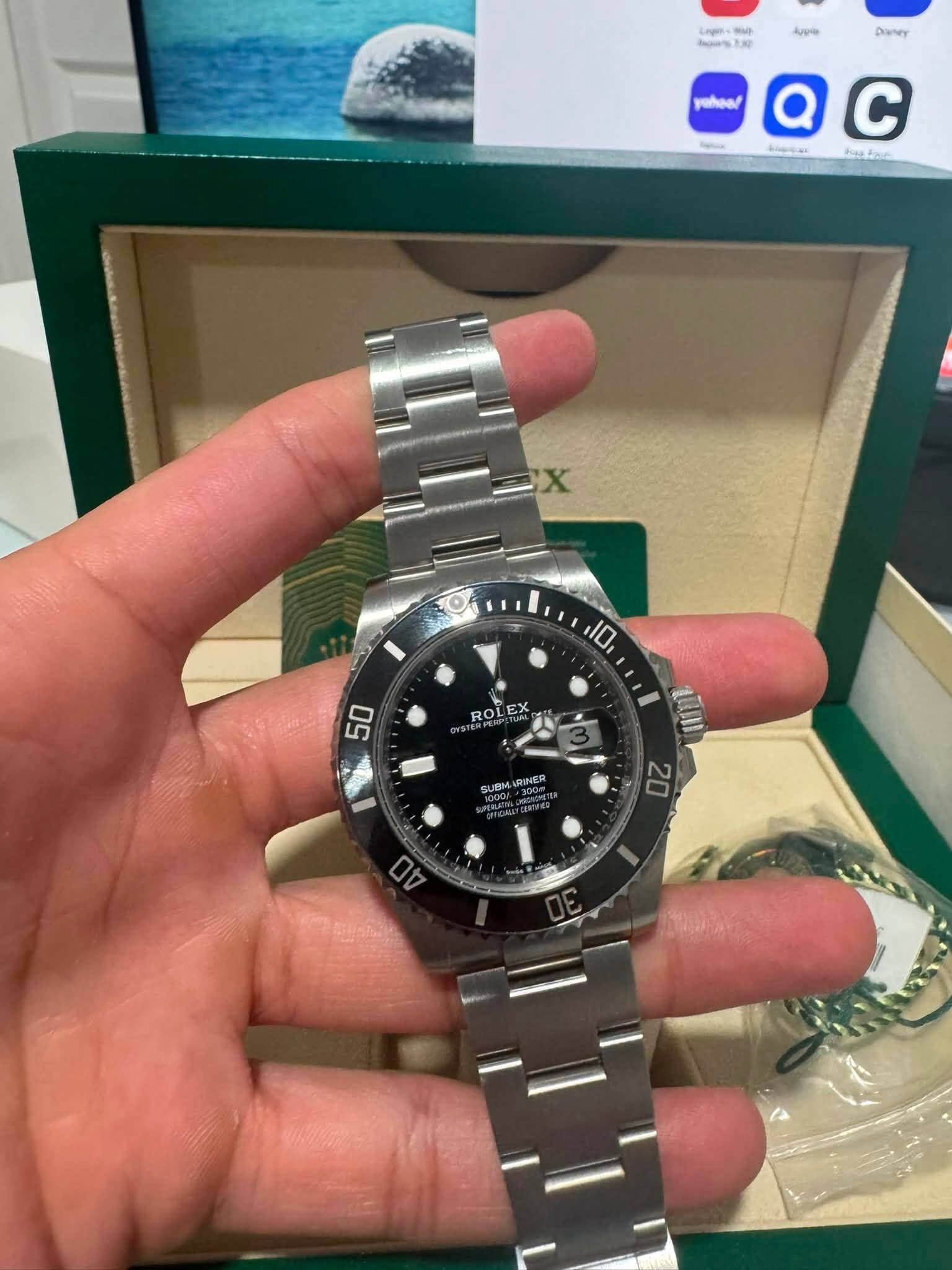 May be an image of wrist watch and text