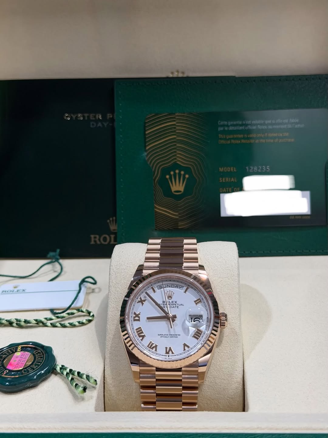 May be an image of wrist watch and text
