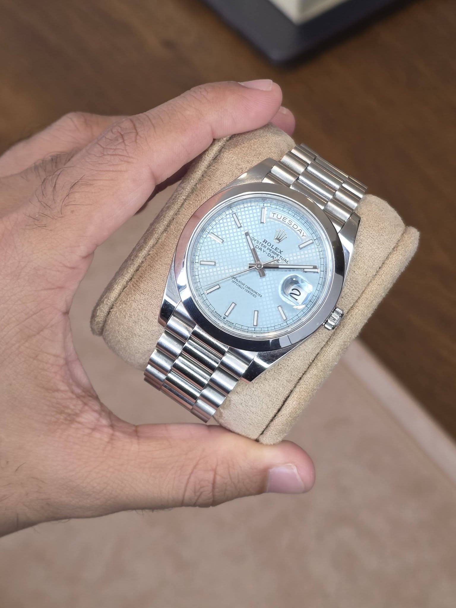 May be an image of wrist watch and text