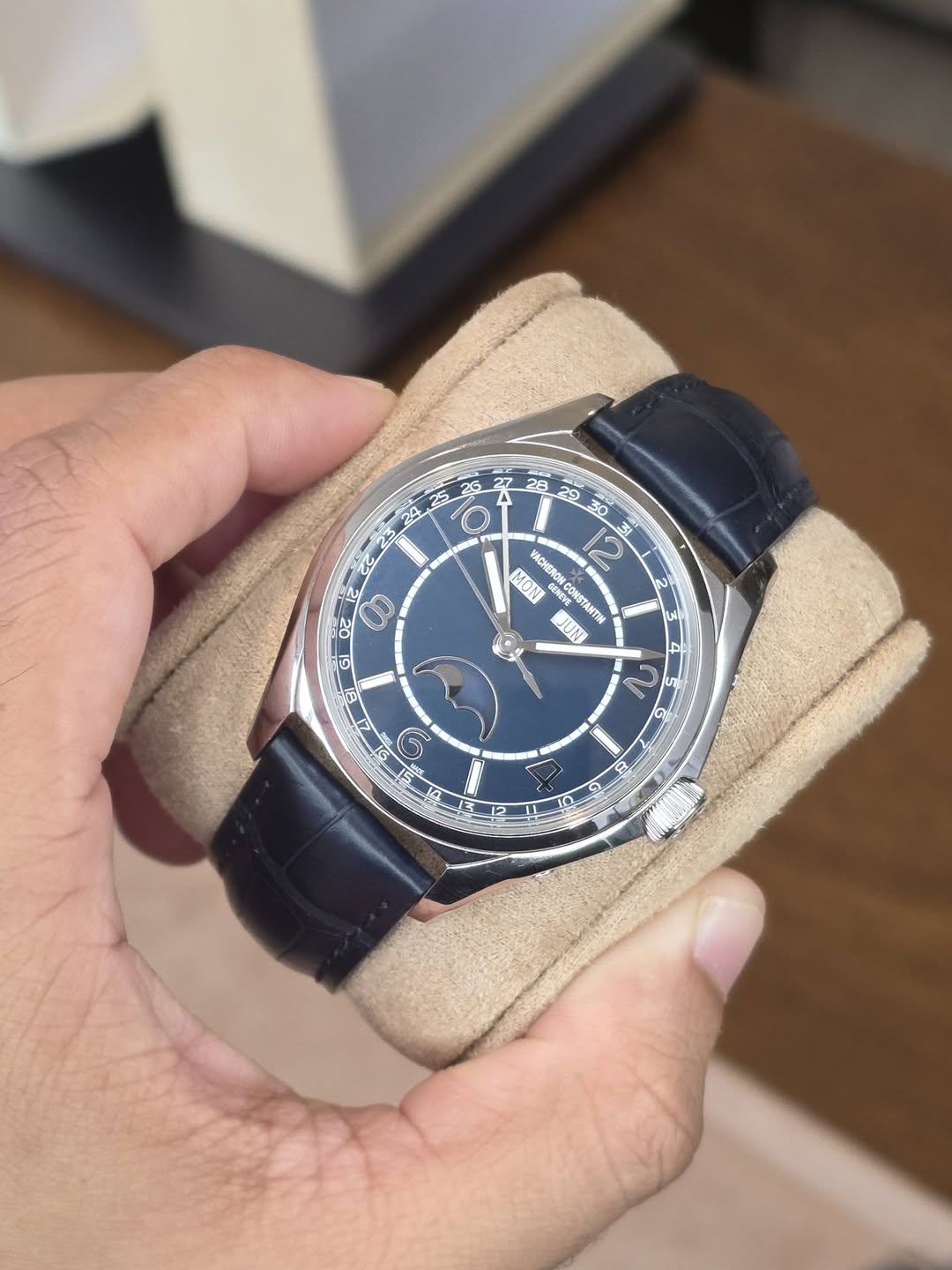 May be an image of wrist watch and text