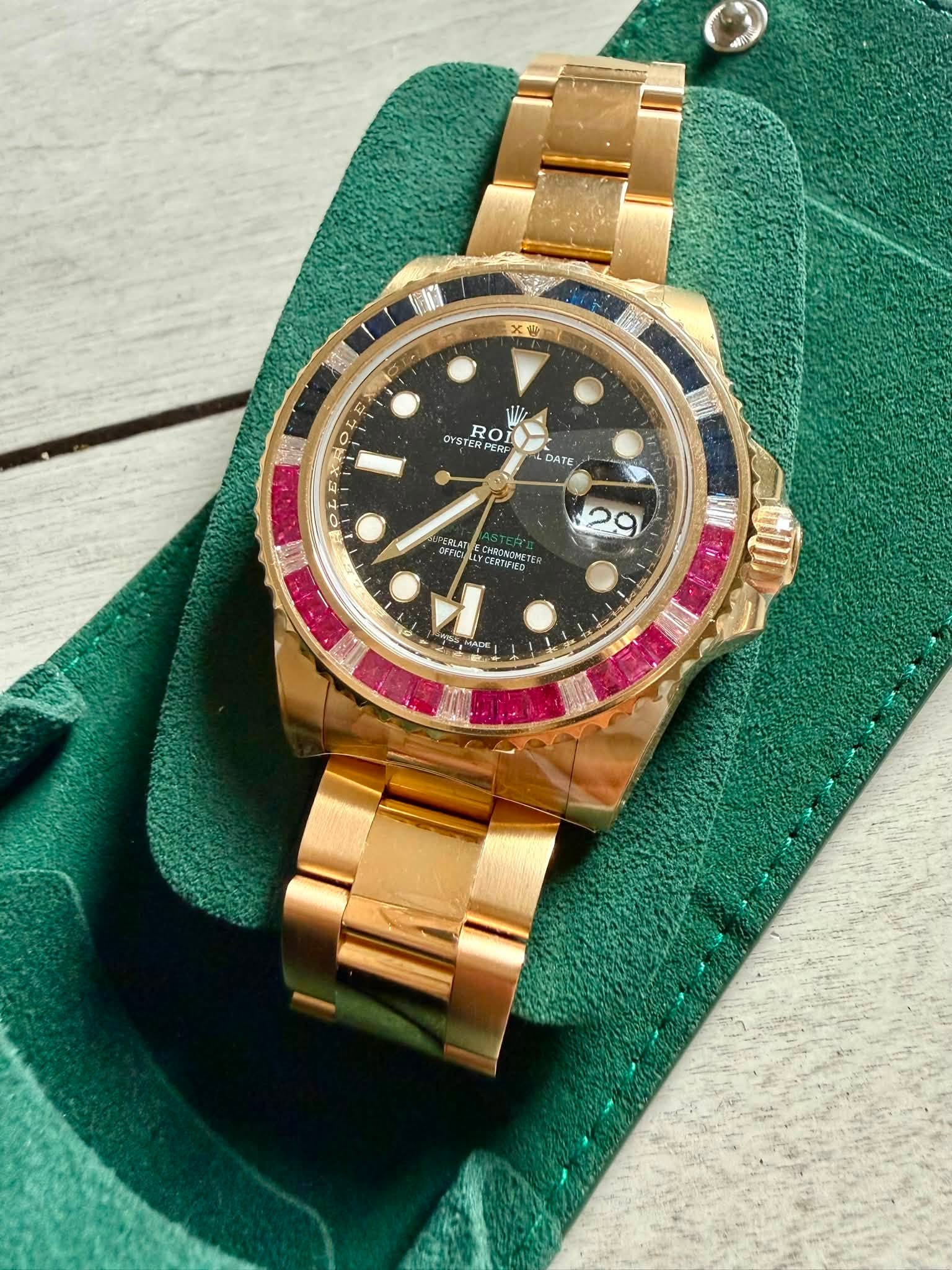 May be an image of wrist watch and text