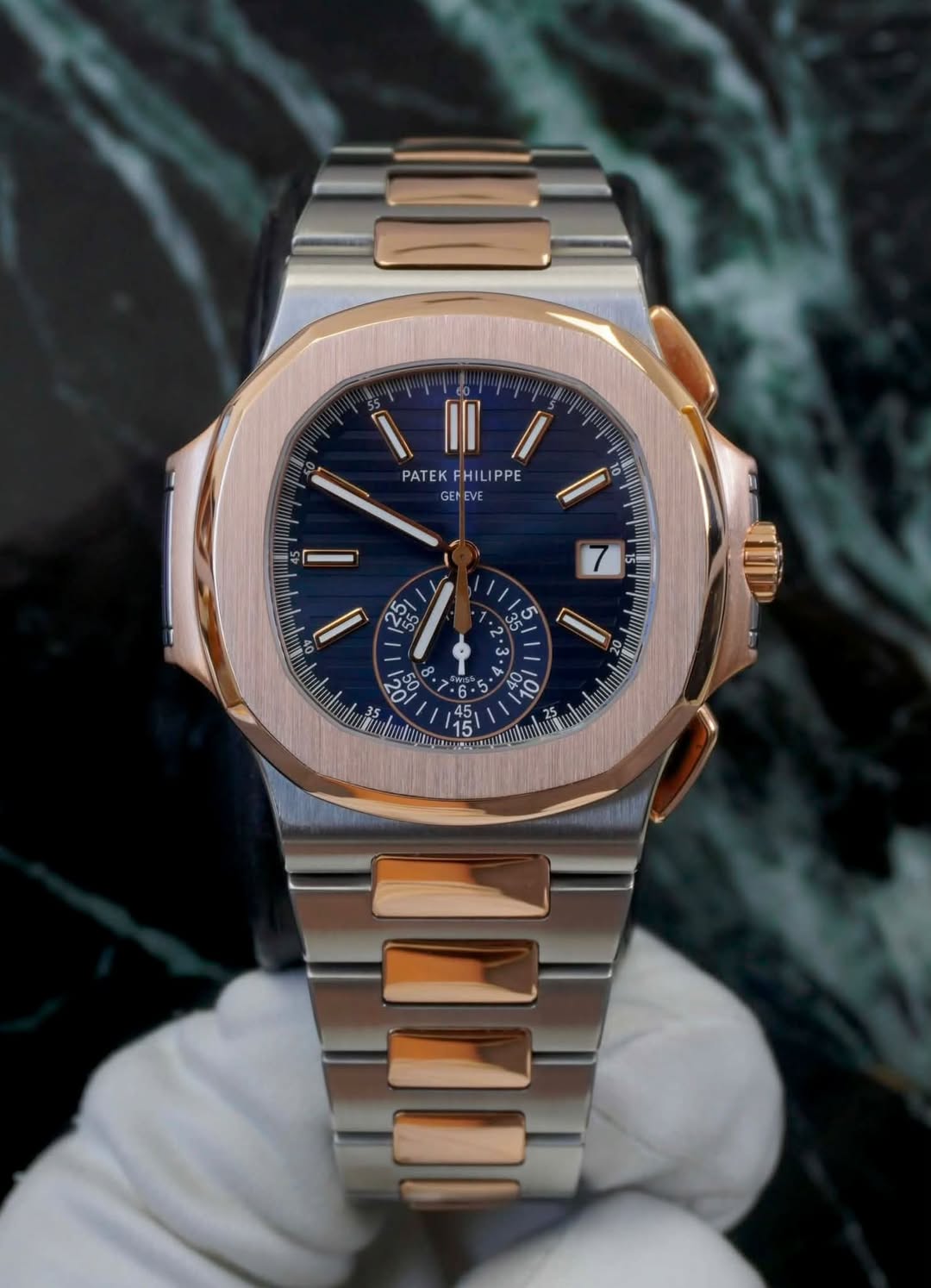 May be an image of wrist watch and text that says 'K0 PATEKFHILIPPE PATEK FHILIPPE GENE GENEVE လမ സഗ 5 07 من '