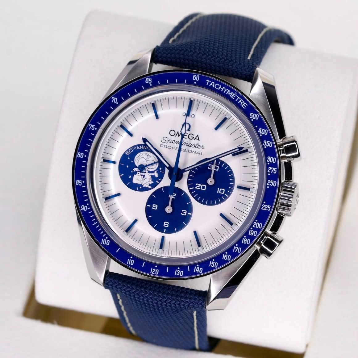 May be an image of wrist watch and text that says '65 20 जੇ ၁၀ 60 TACHYMETRE ANA Snee Sneenaste naster SIONAL OMEGA PROFE 350 ហុ ian 13g'