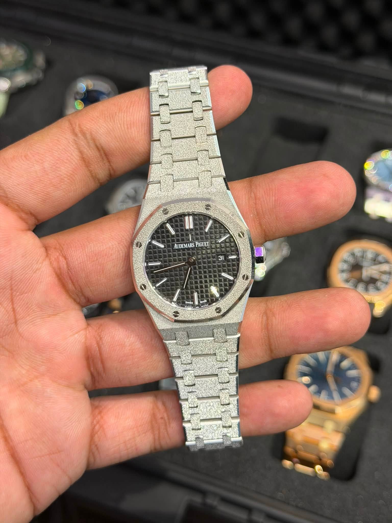 May be an image of wrist watch and text