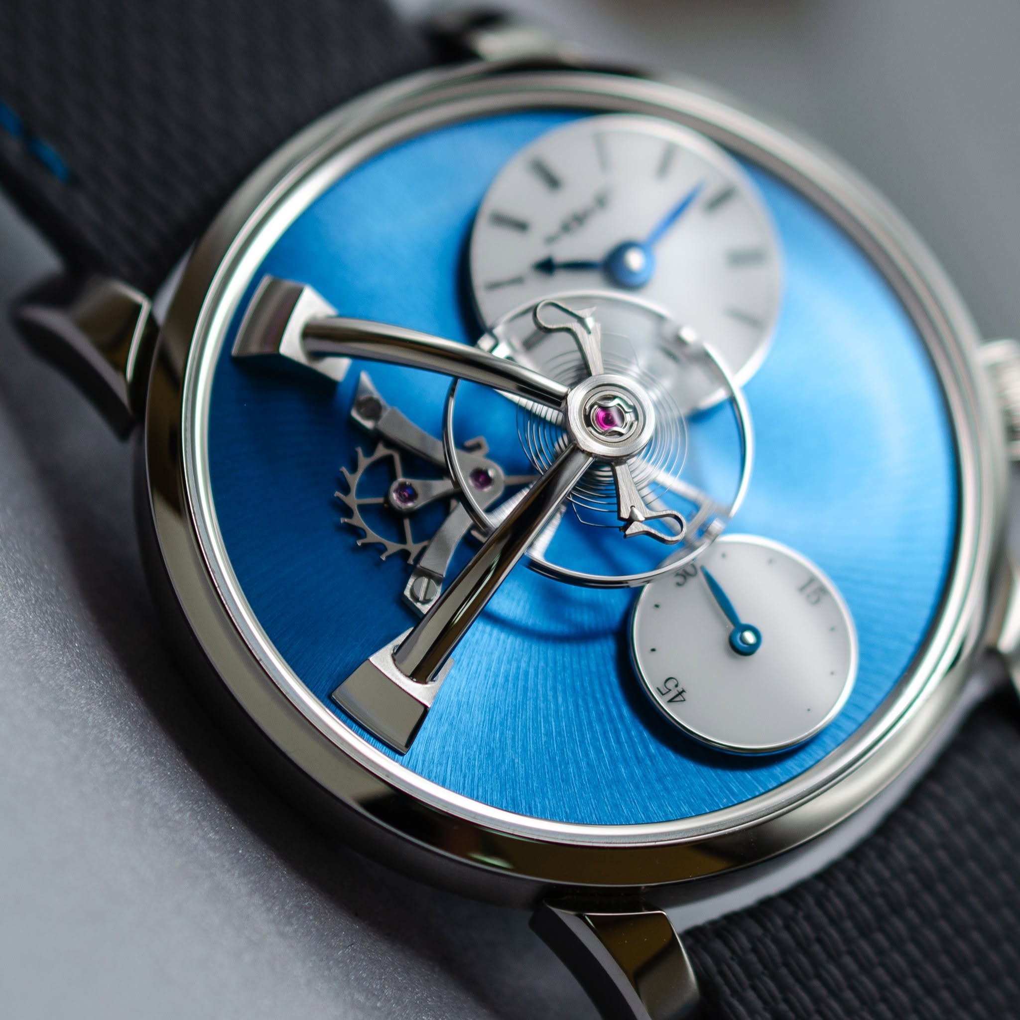 May be an image of wrist watch and text
