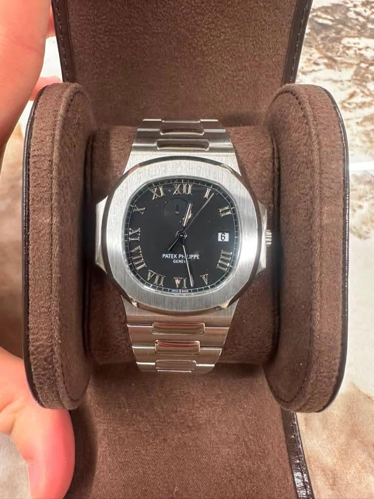 May be an image of wrist watch and text that says 'XI XXX WV PATEK PATEKPhJP Phu IPPE GENE UI 6 ππ IIIA TI TPE LEB'