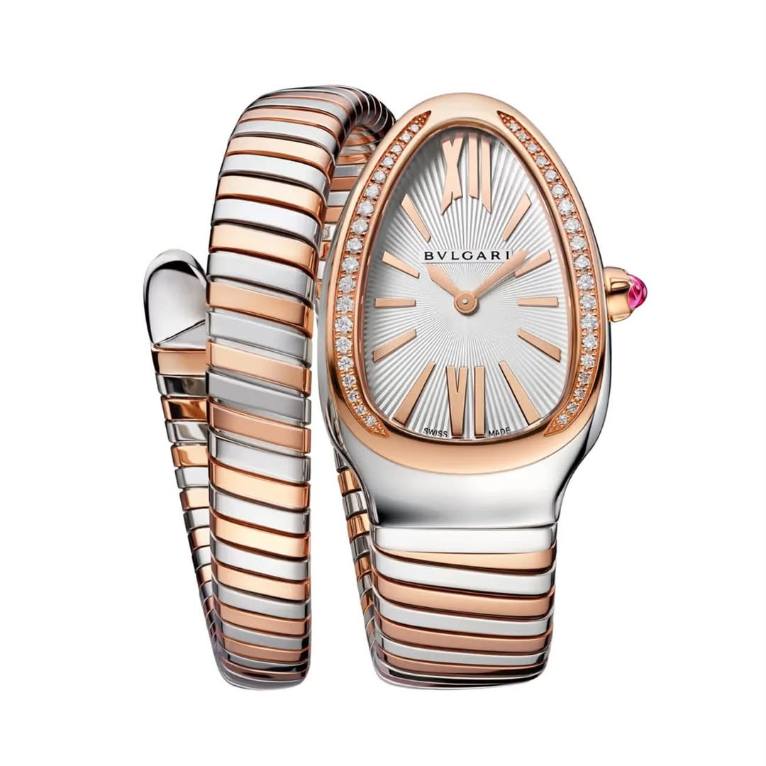 May be an image of wrist watch and jewelry
