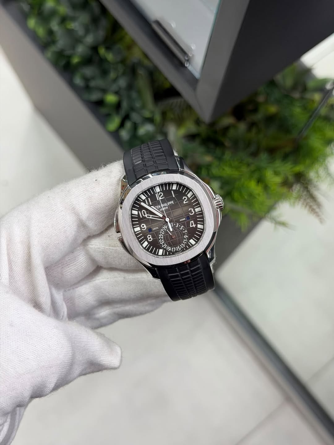 May be an image of wrist watch and text
