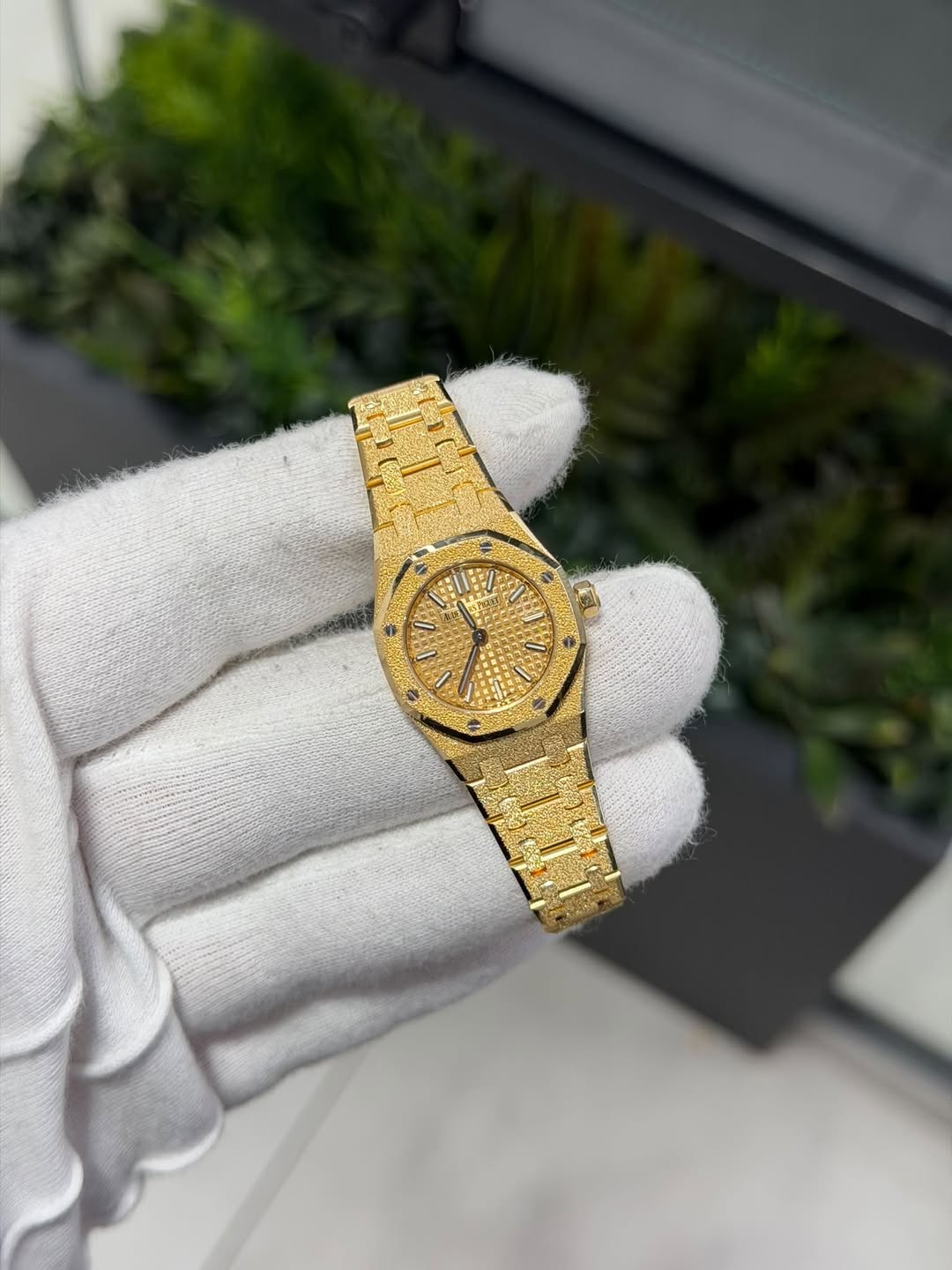 May be an image of wrist watch and text