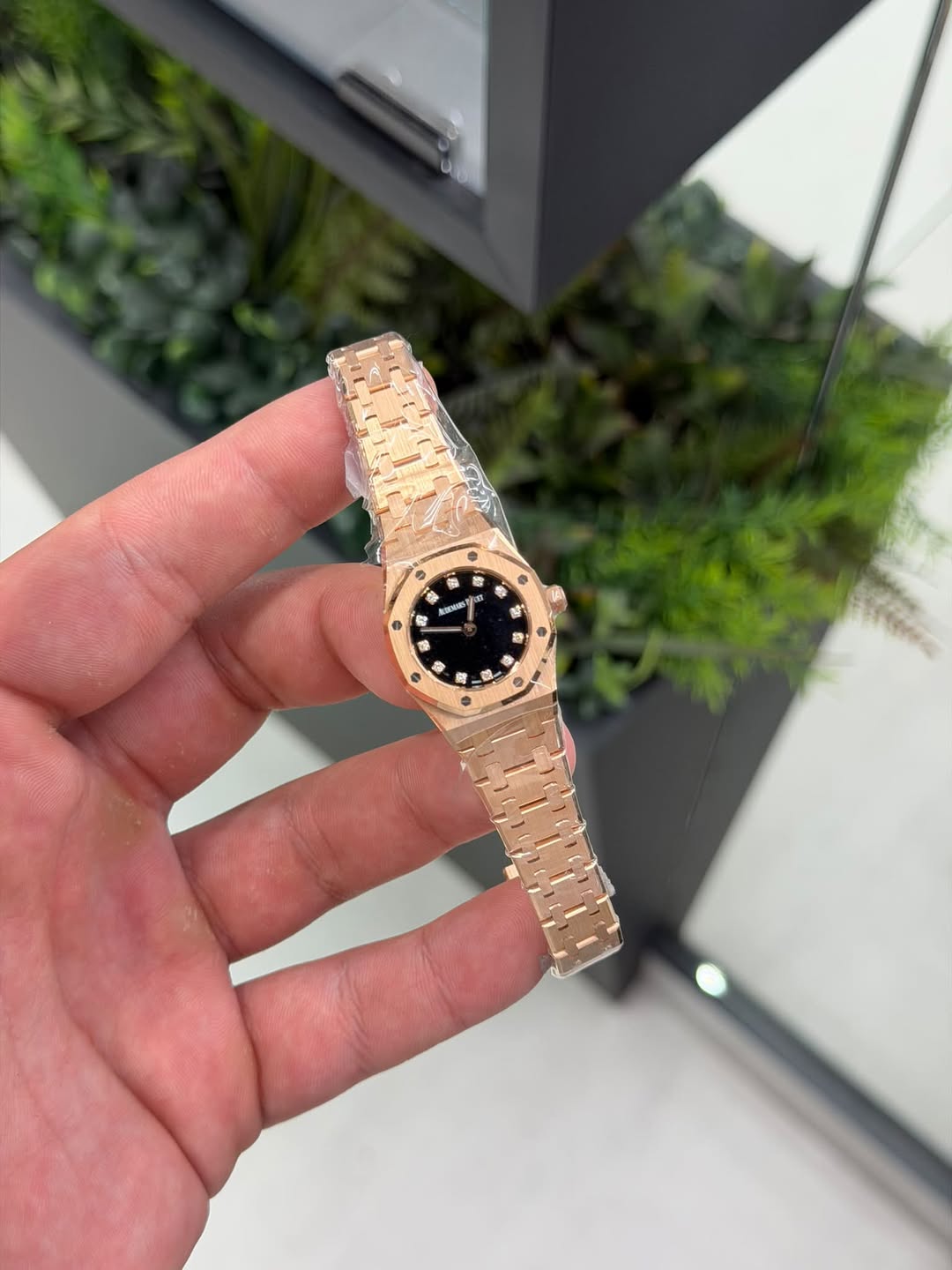 May be an image of wrist watch and text