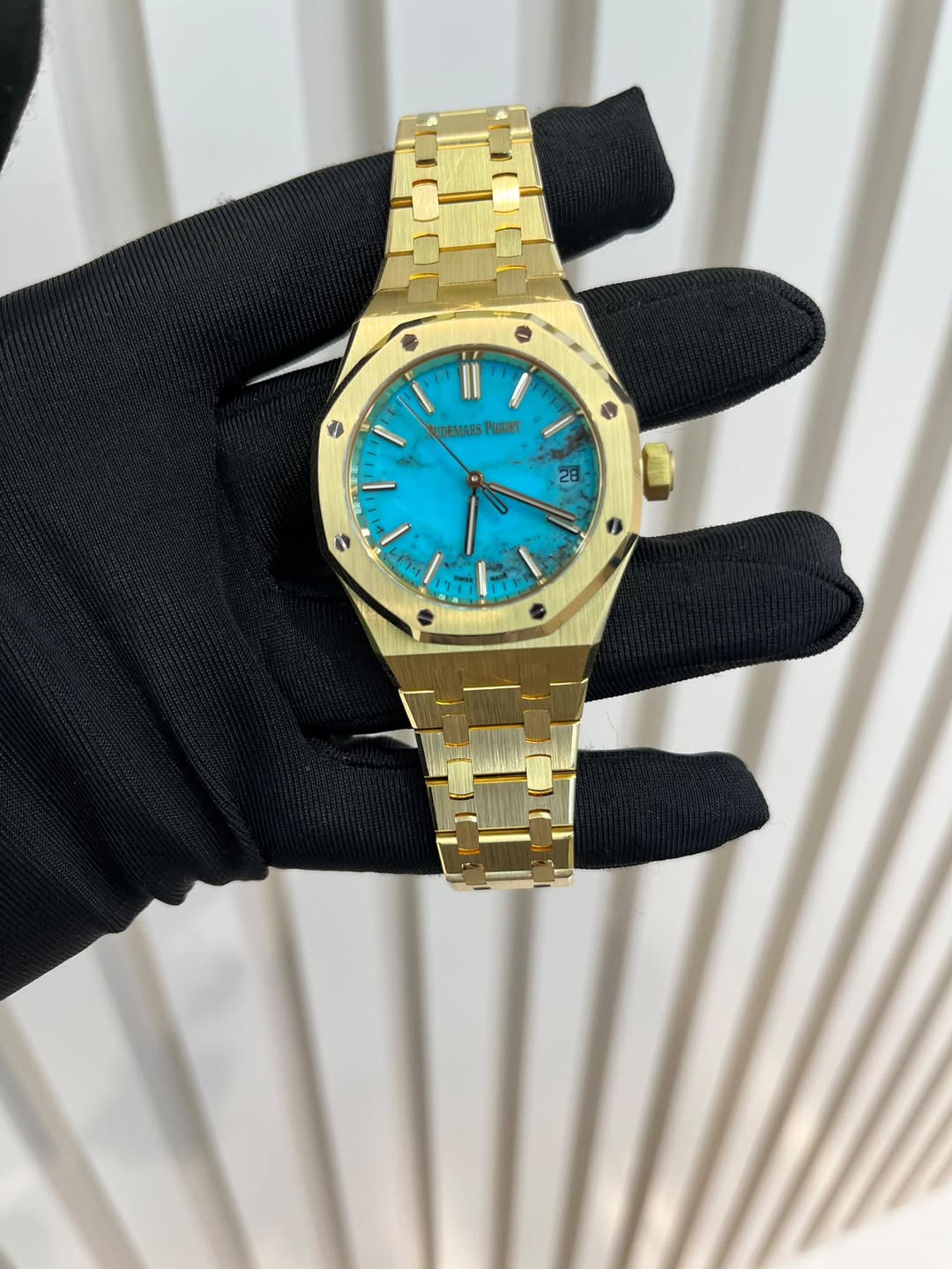 May be an image of wrist watch and text that says 'N II TEMARS ገወቤ፣ 28 f 4 ን. N L TE'