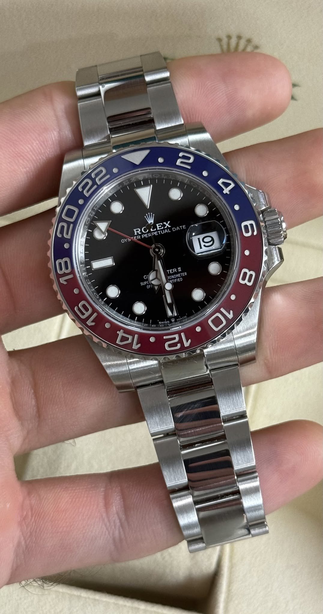 May be an image of wrist watch and text