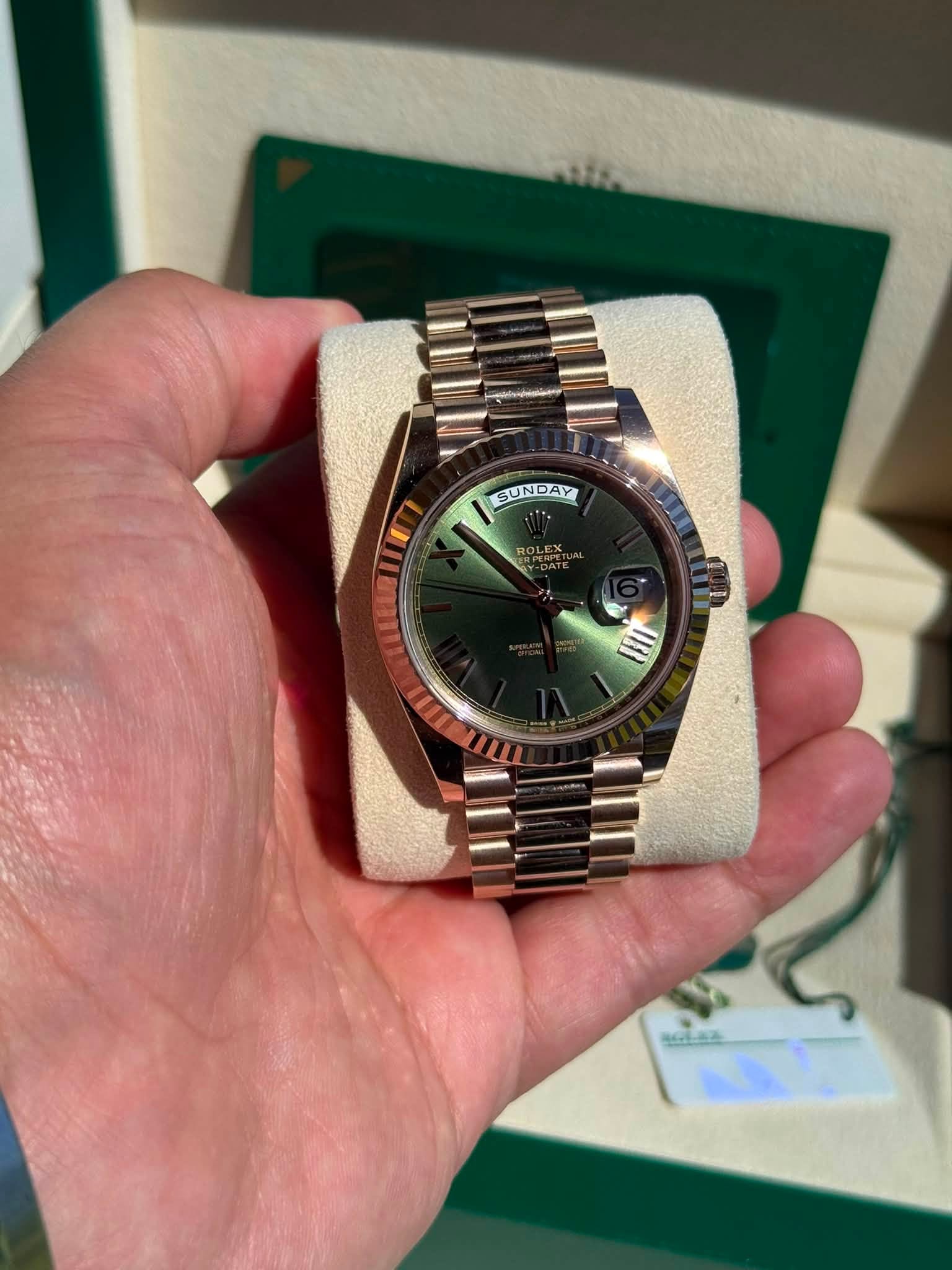 May be an image of wrist watch and text