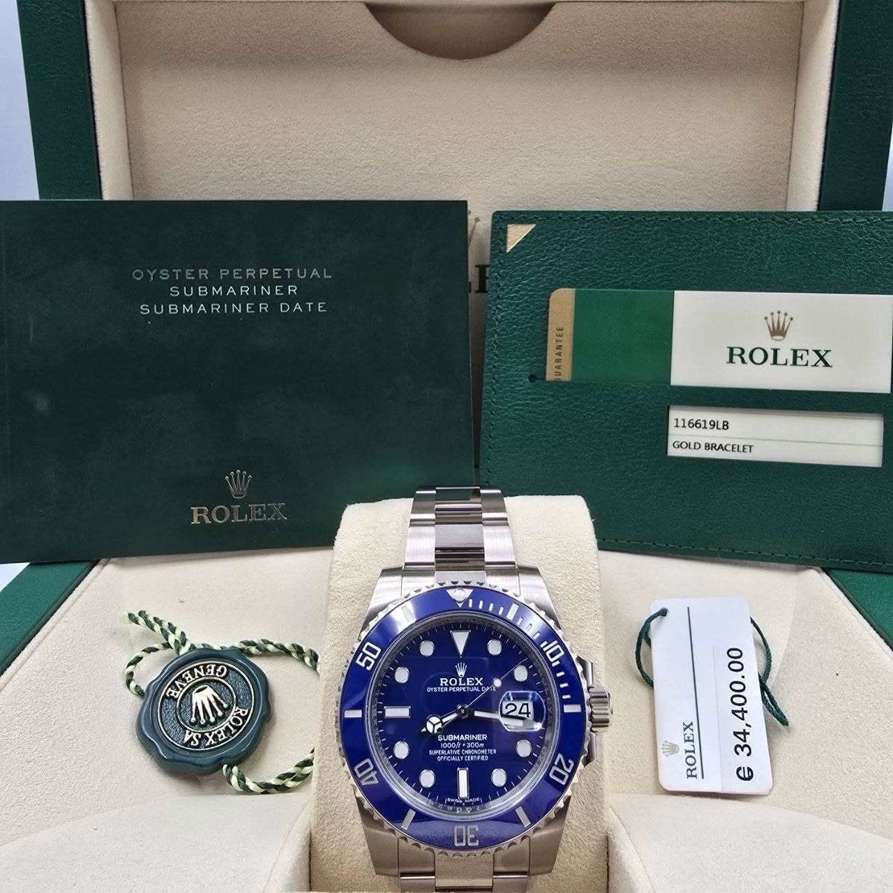 May be an image of wrist watch and text that says 'ERPERPETUA SUBMARINER NER SUBMARINER DAT UARANTLE ROLEX 116619LB GOLD GOLD BRACELET 50 出 ROLEX GLE 10 SABNER VS างย I 24 24…