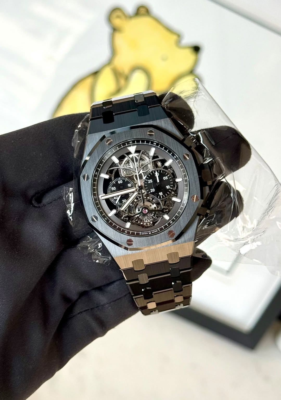 May be an image of wrist watch and text