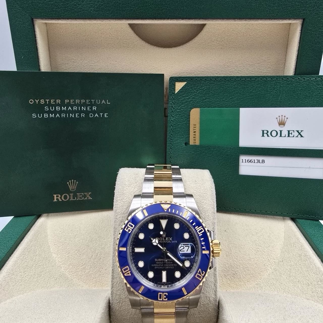 May be an image of wrist watch and text that says 'OYSTERPERPETUAL AL OYSTER SUBMARINER SUBMARINER DATE 生 ROLEX 116613LB 116613LB ROLEX RO 50 1 I 10 T '