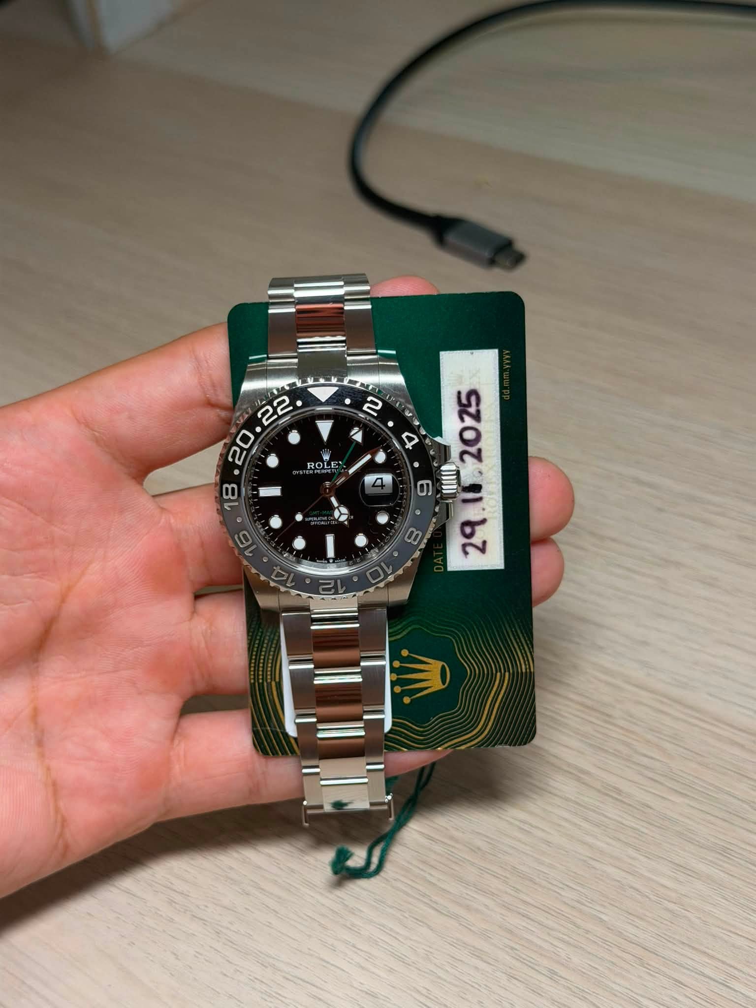 May be an image of digital watch and text