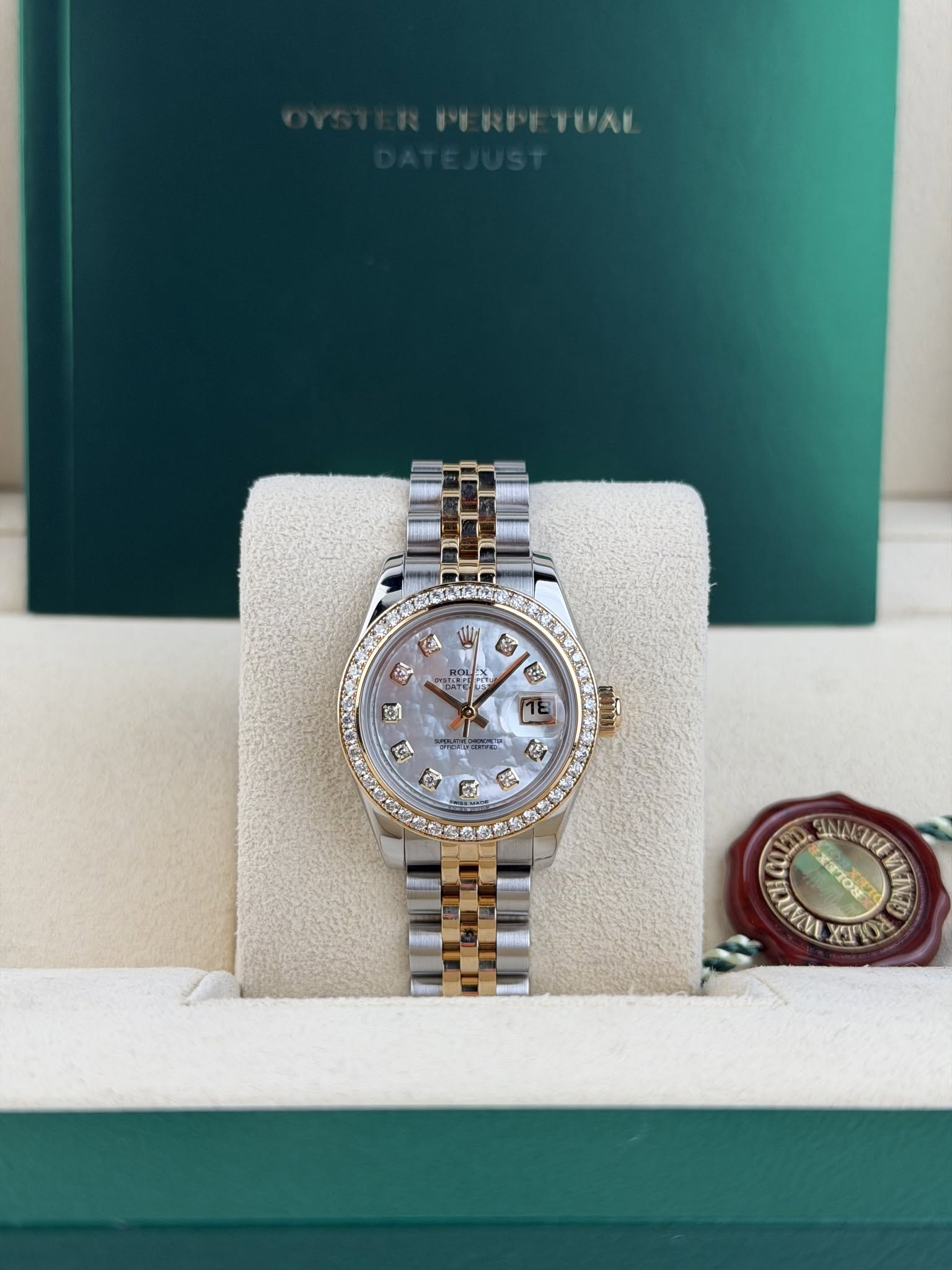 May be an image of wrist watch and text