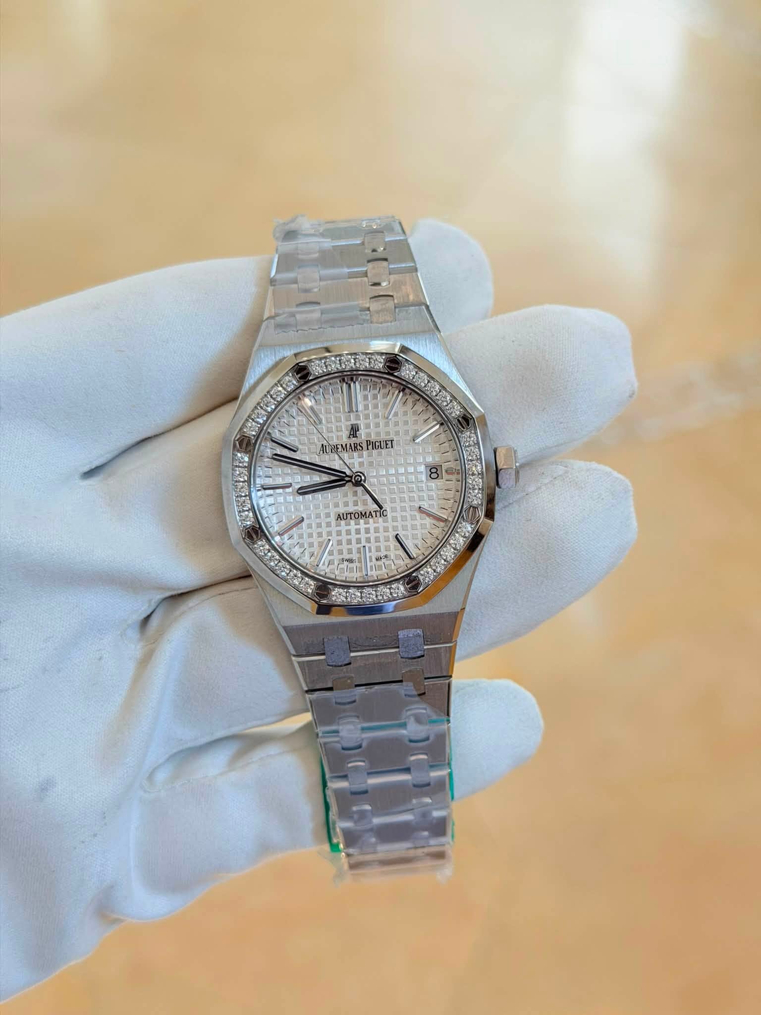 May be an image of wrist watch and text
