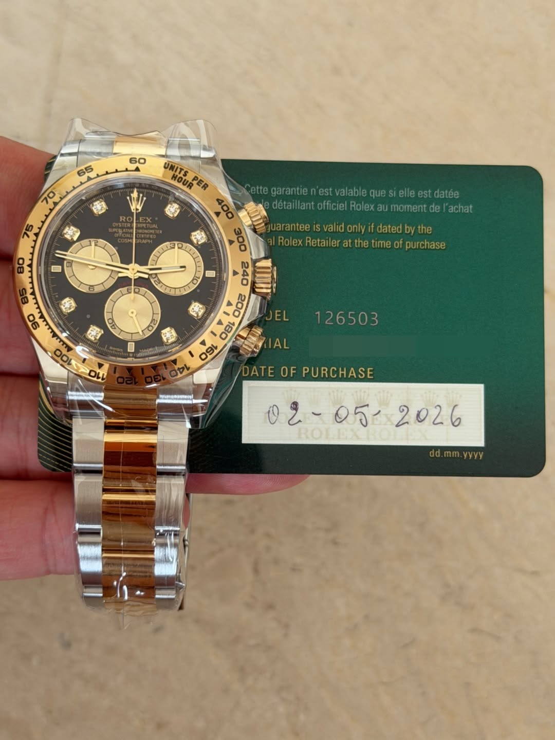 May be an image of wrist watch and text