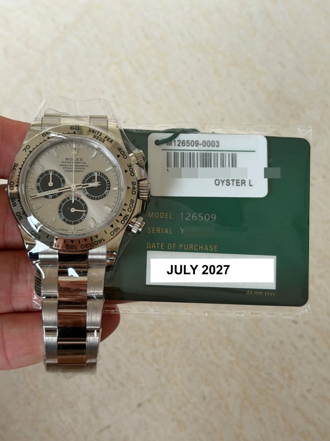 May be an image of wrist watch and text