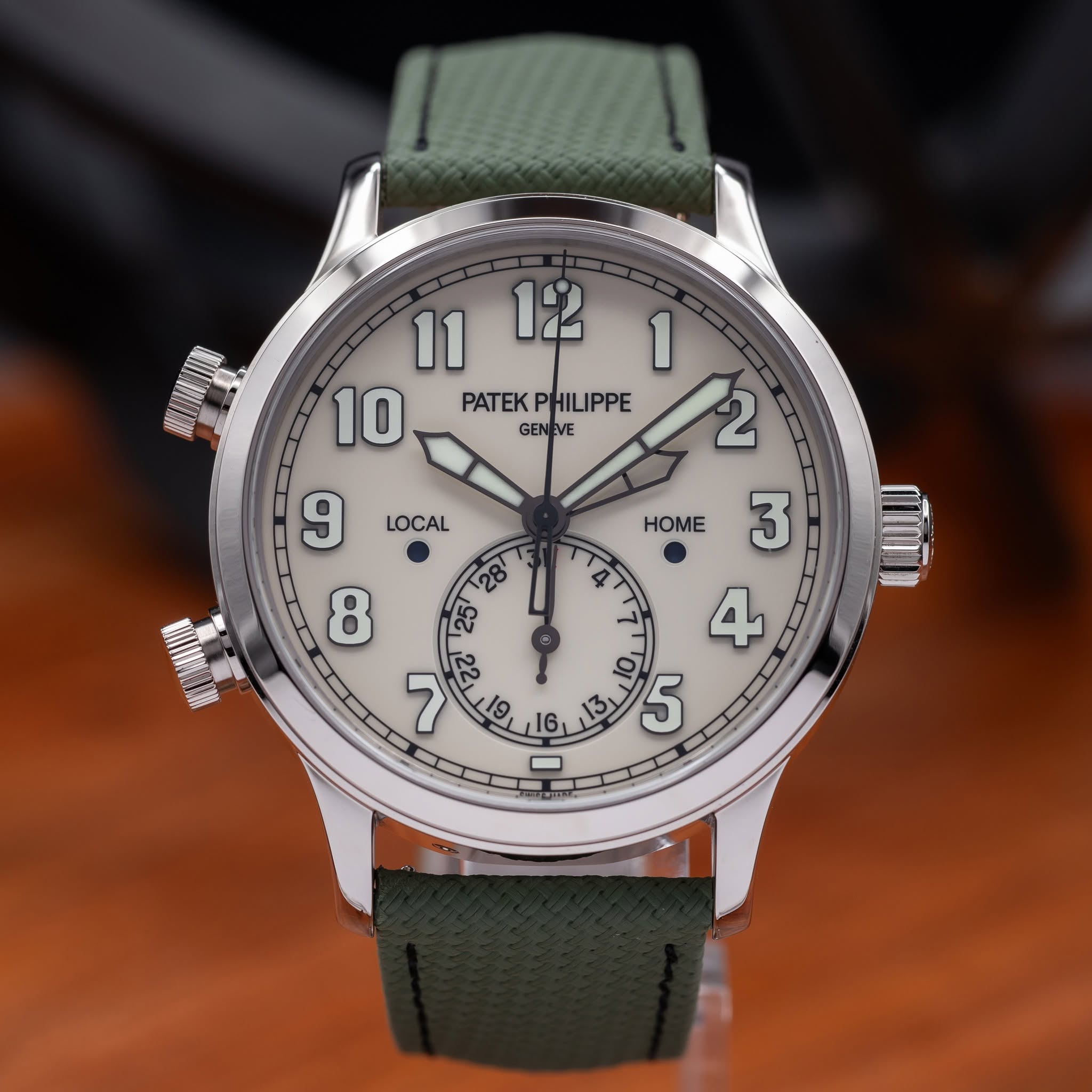 May be an image of wrist watch and text that says 'וונסם LOCAL PATEKPHILIPPE HILIPPE 2 PATEK GENEVE VE GEN 1O 5 19 16」 0 HOME'