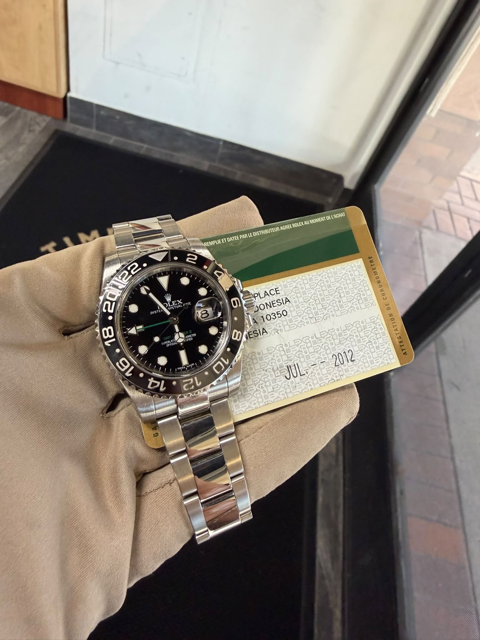 May be an image of wrist watch and text