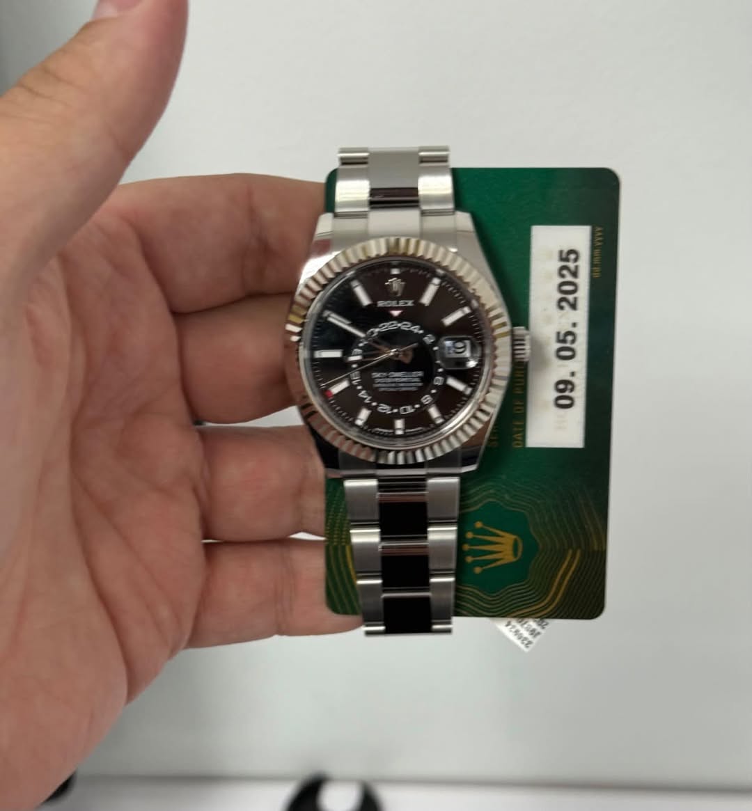 May be an image of wrist watch and text