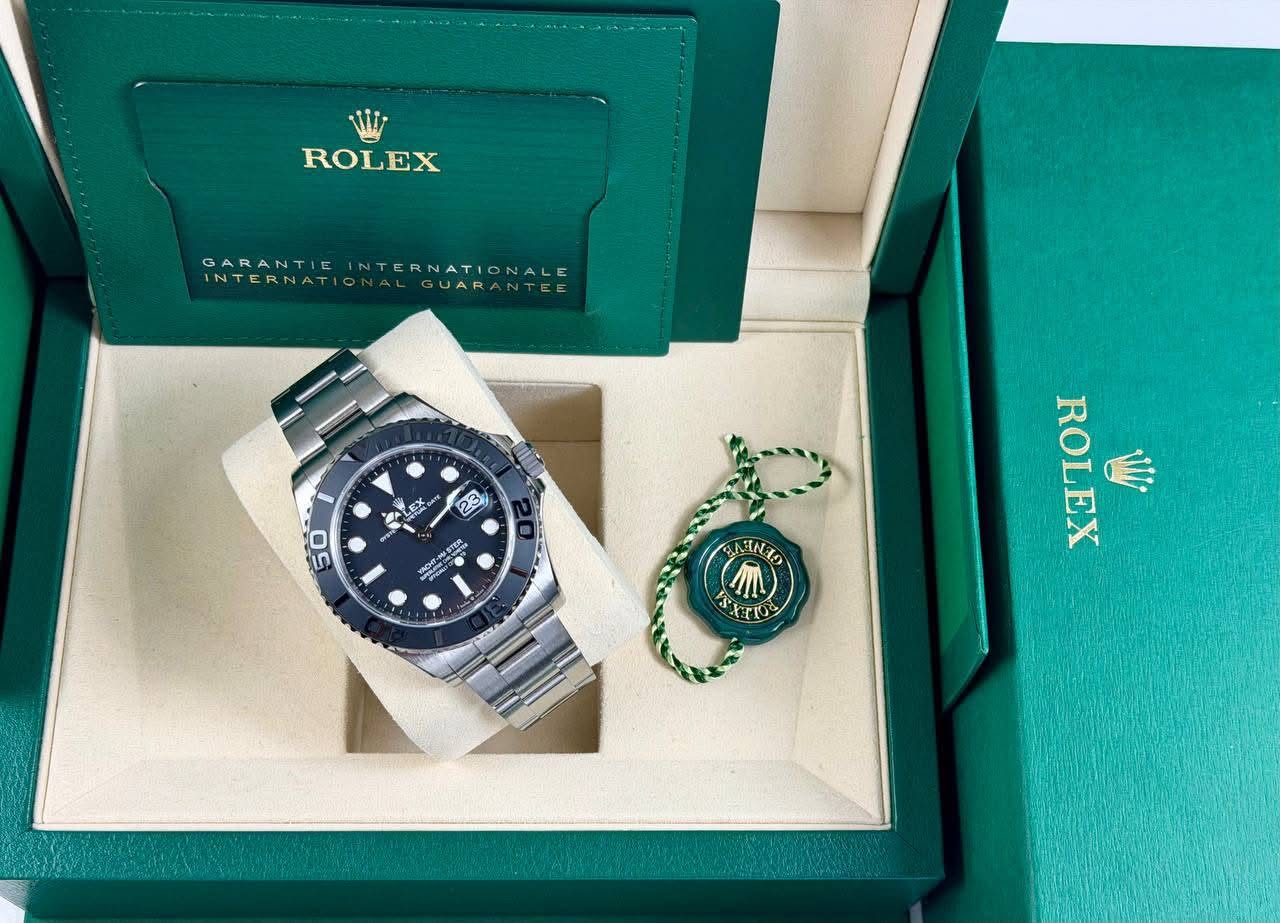 May be an image of wrist watch and text that says 'ROLEX GARANTIE INTERNATIONALE GARANTIEINTERNATIONALE INTE INTERNATI INTERNATIONALGUARANTEE IONALGUARANTEE GUAR 一夢 A S3 50 MESTEN…
