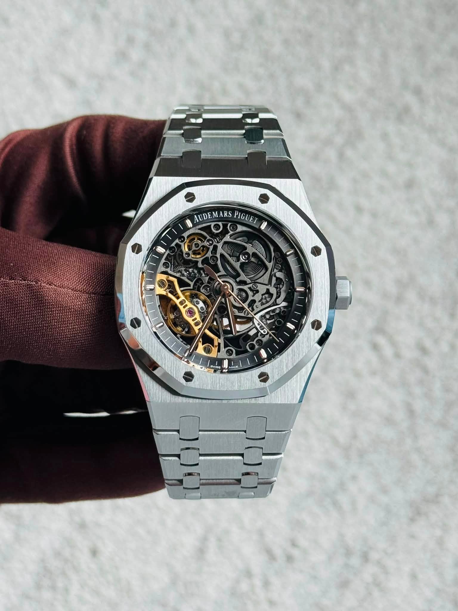 May be an image of wrist watch and text