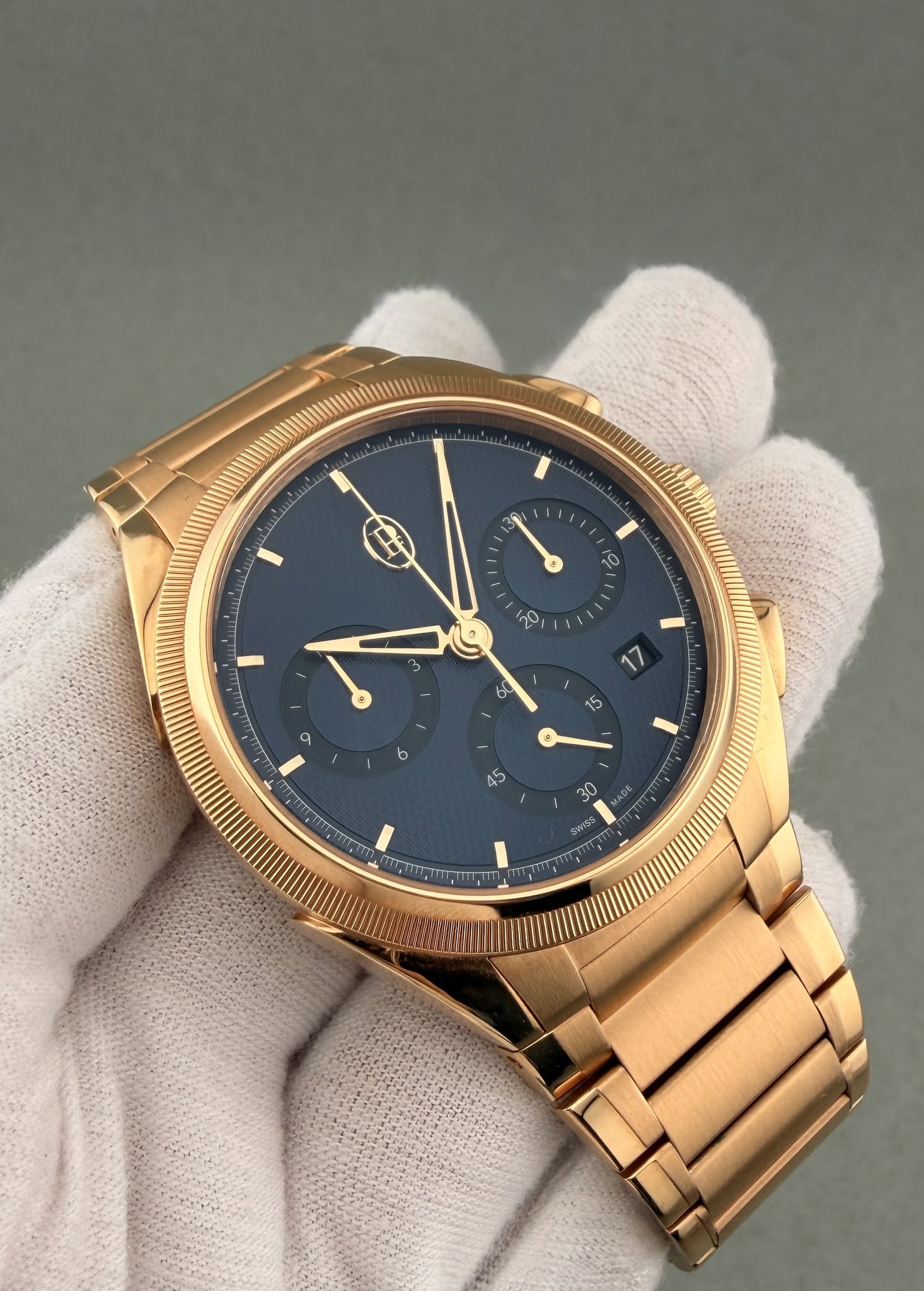 May be an image of wrist watch and text