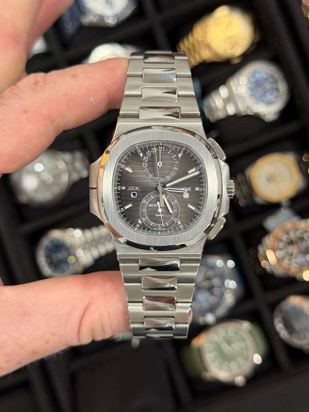 May be an image of wrist watch and text
