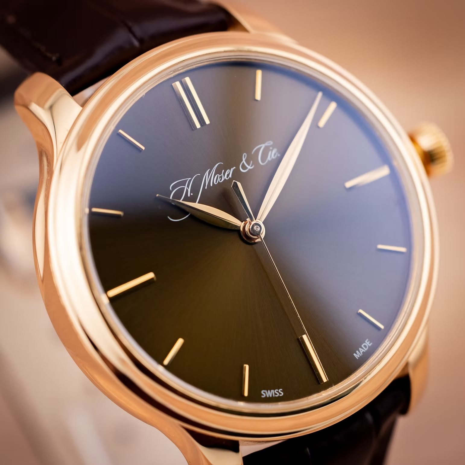 May be an image of wrist watch and text that says 'NΓ΄y& &Tic Tic Mhao 10 MADE I SWISS'
