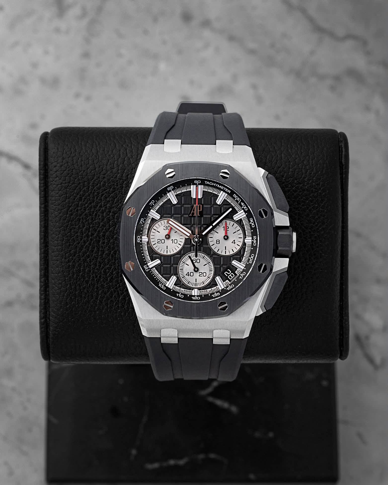 May be an image of wrist watch and text